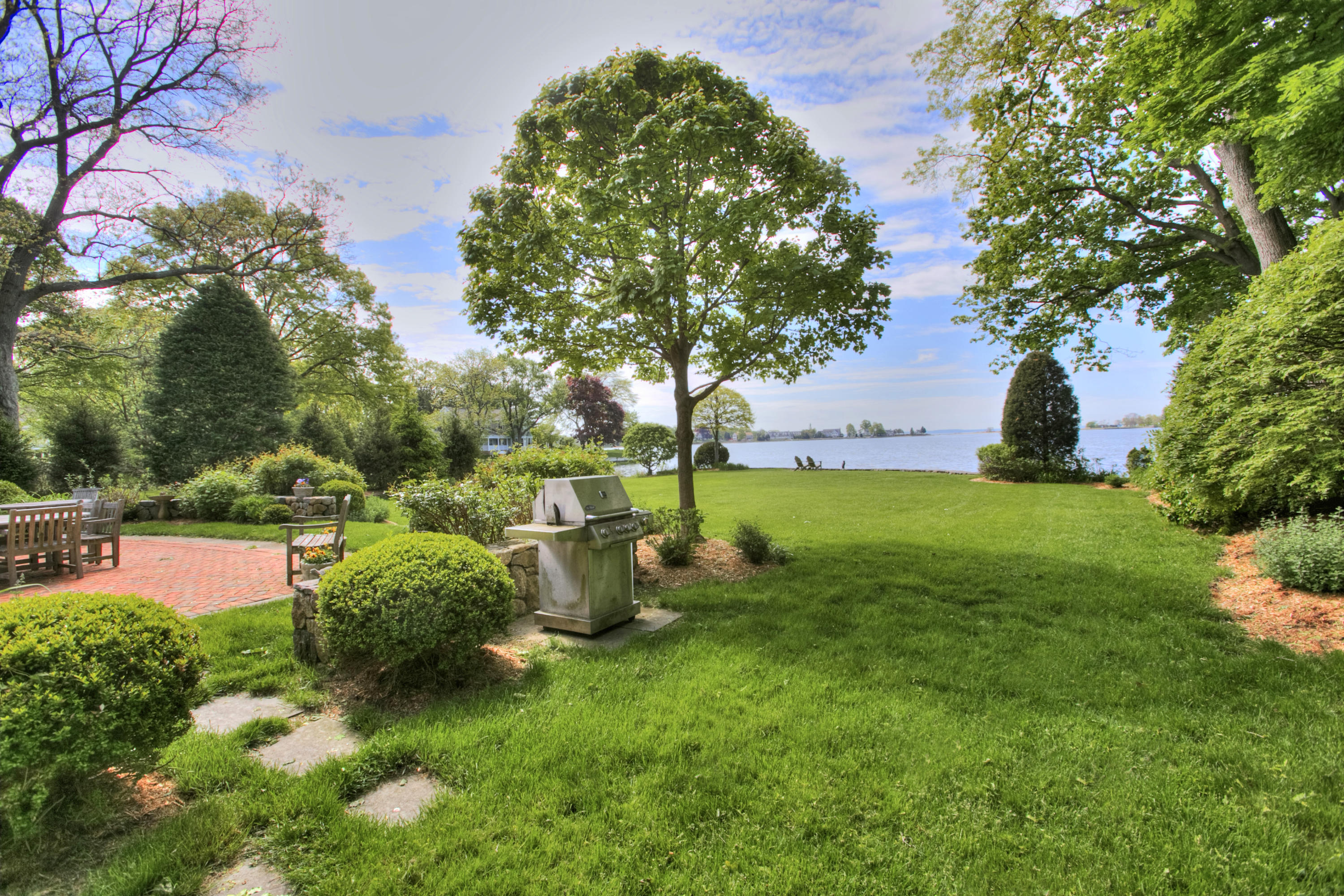 9 Seagate Road Darien, CT 06820 - Photo 31 of 32 a view of a backyard with sitting area
