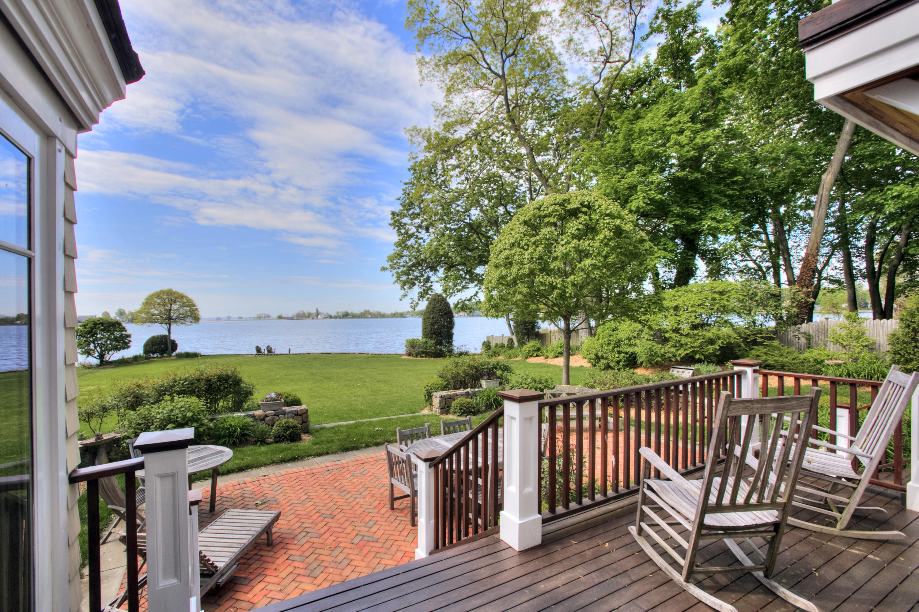 9 Seagate Road Darien, CT 06820 - Photo 8 of 32 a view of a table and chairs on the roof deck