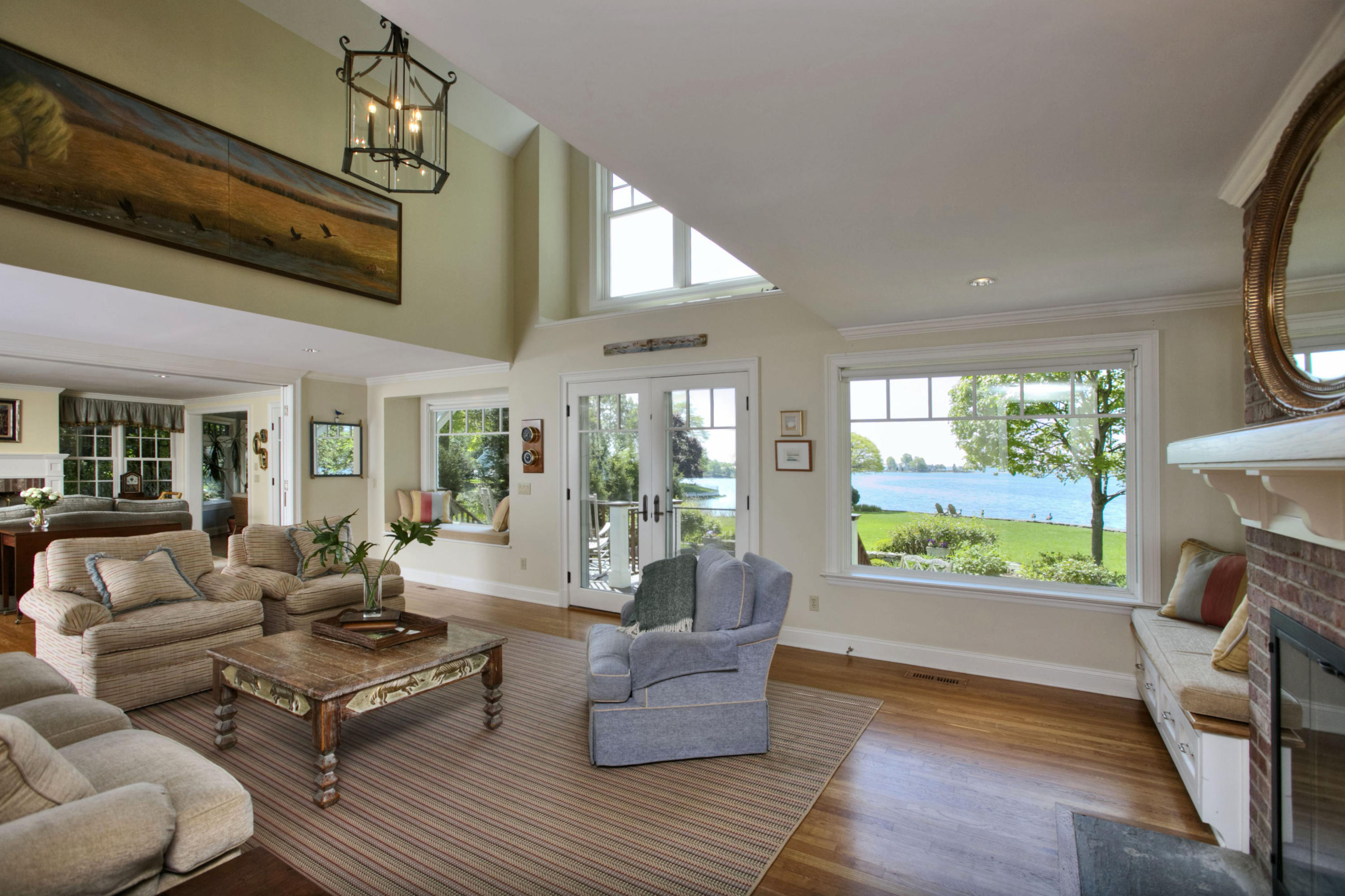 9 Seagate Road Darien, CT 06820 - Photo 10 of 32 a living room with furniture and a fireplace