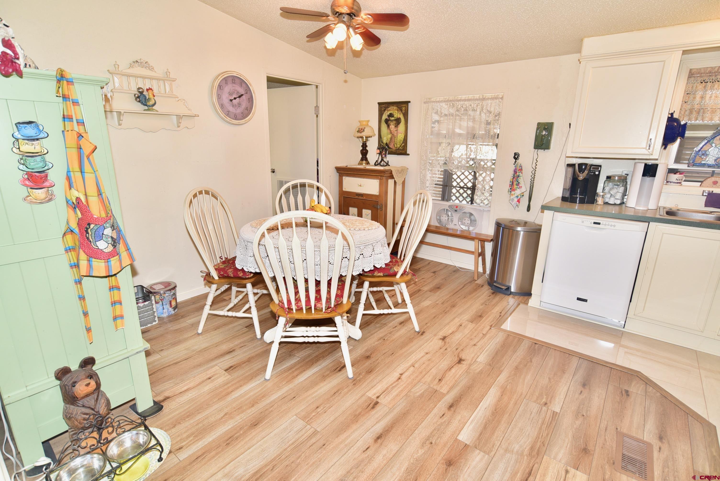 20020 Kenosha Road Austin, CO 81410 - Photo 11 of 40 a dining room with furniture and window