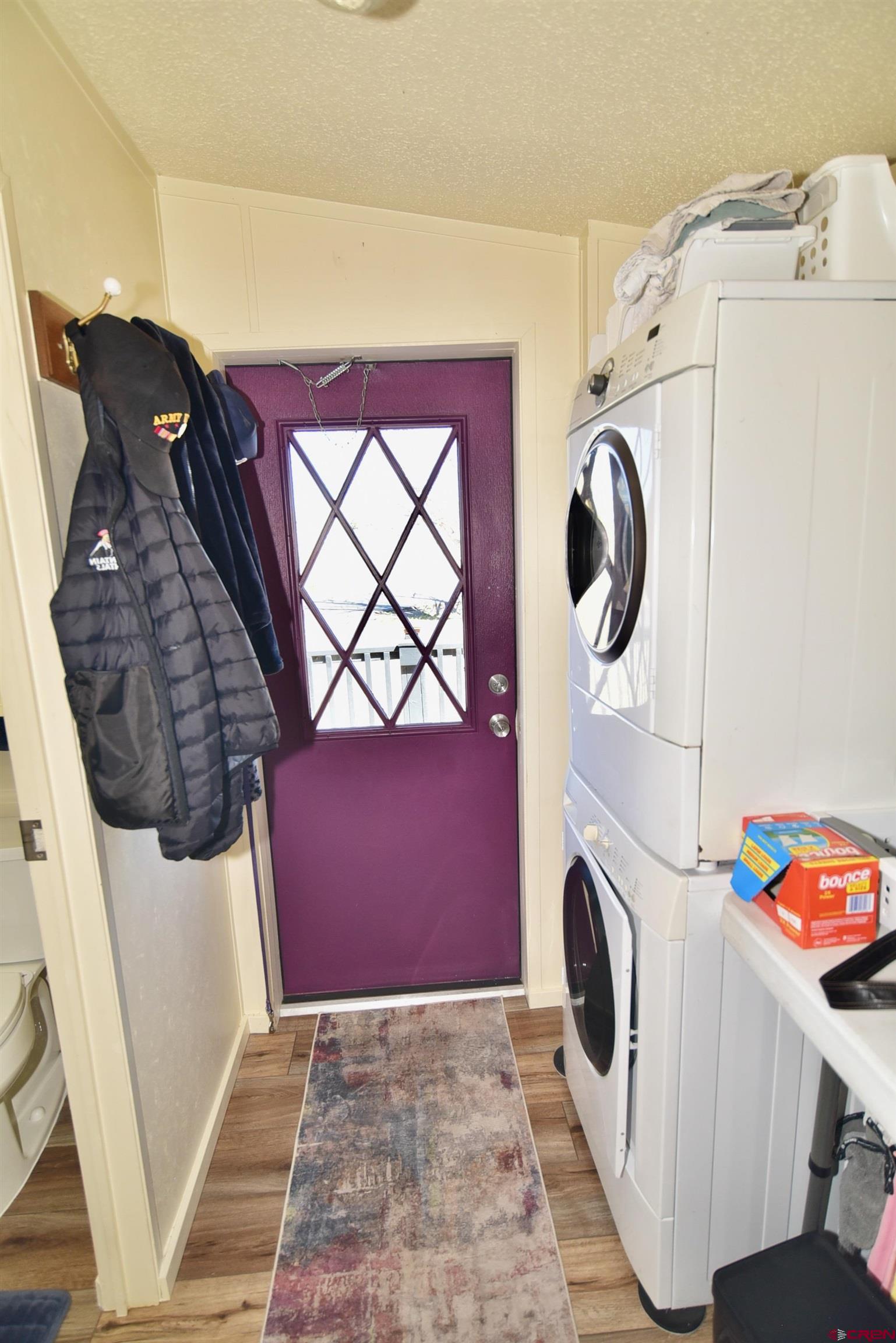 20020 Kenosha Road Austin, CO 81410 - Photo 20 of 40 a utility room with dryer and washer