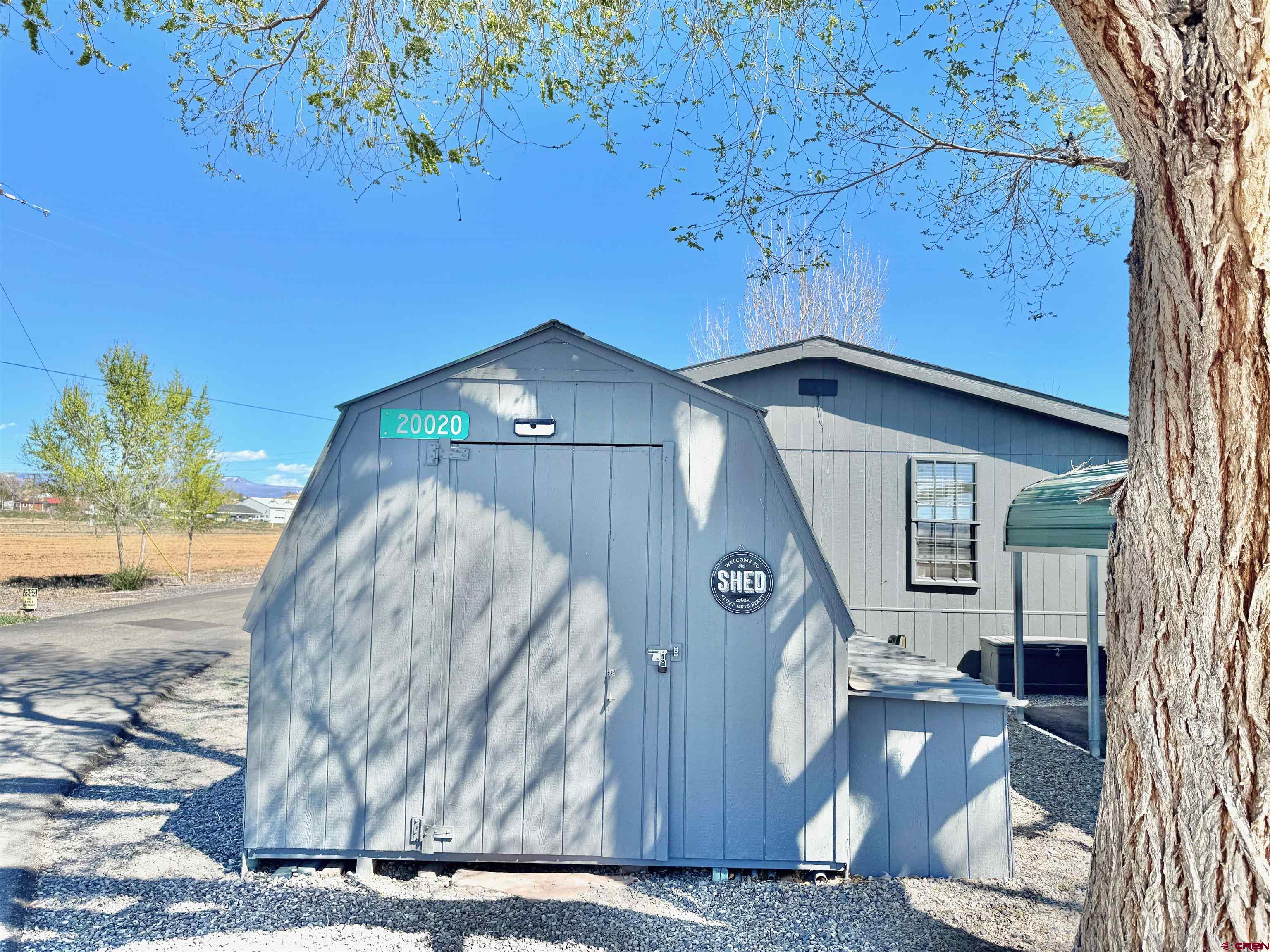 20020 Kenosha Road Austin, CO 81410 - Photo 21 of 40 a house view with a wooden door