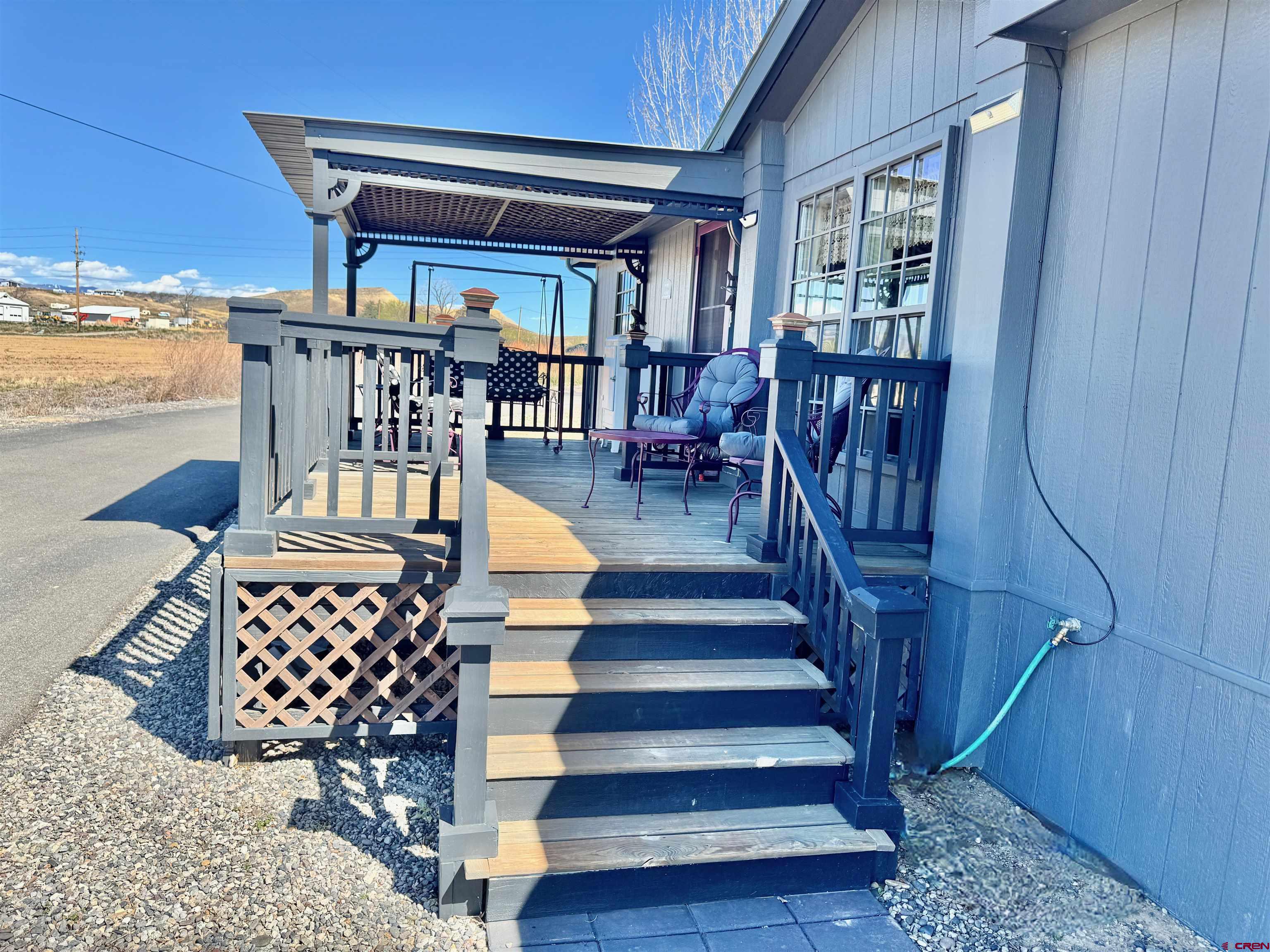 20020 Kenosha Road Austin, CO 81410 - Photo 22 of 40 a view of staircase with furniture and window