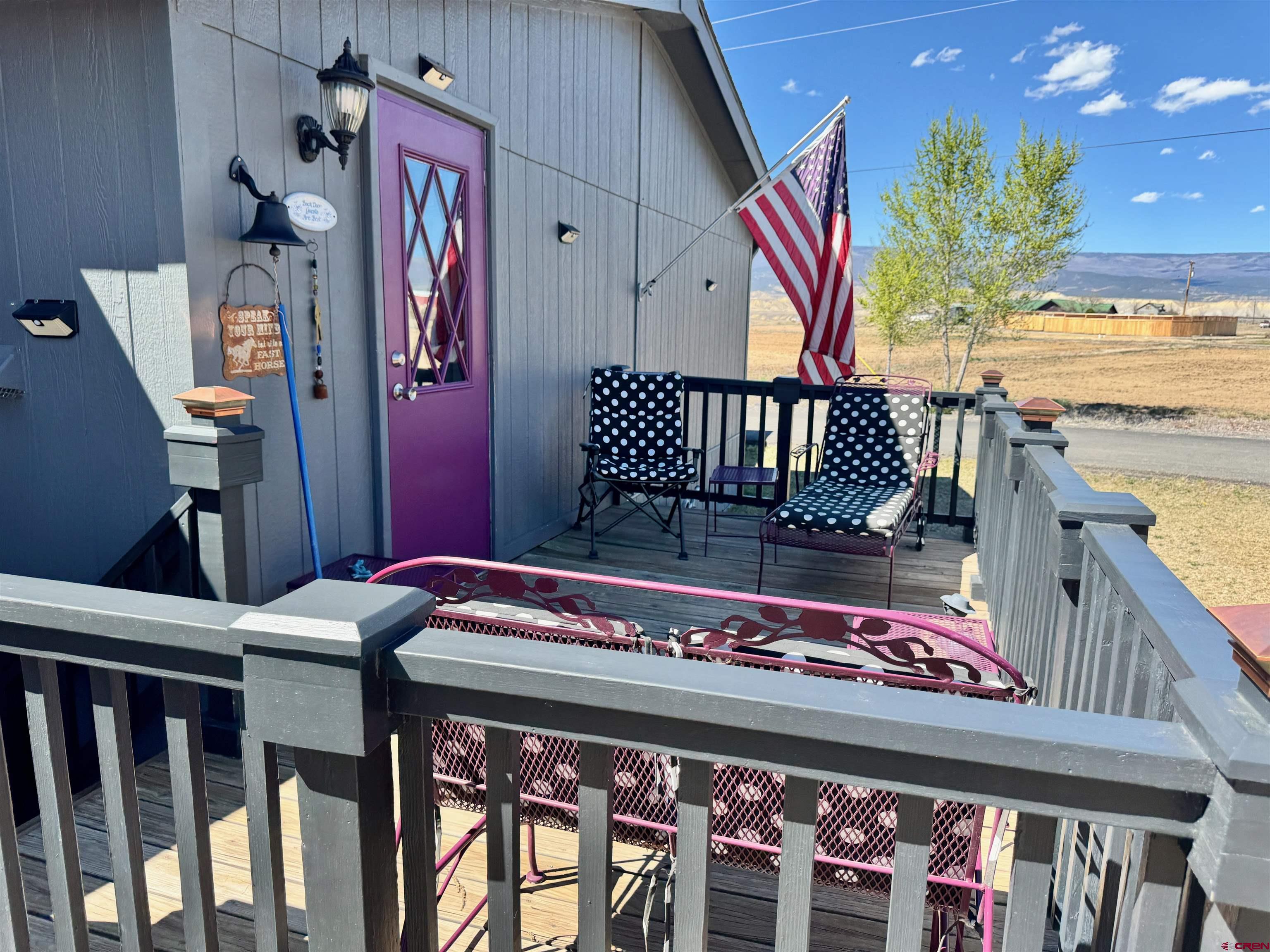 20020 Kenosha Road Austin, CO 81410 - Photo 27 of 40 a view of an chairs and table in the balcony