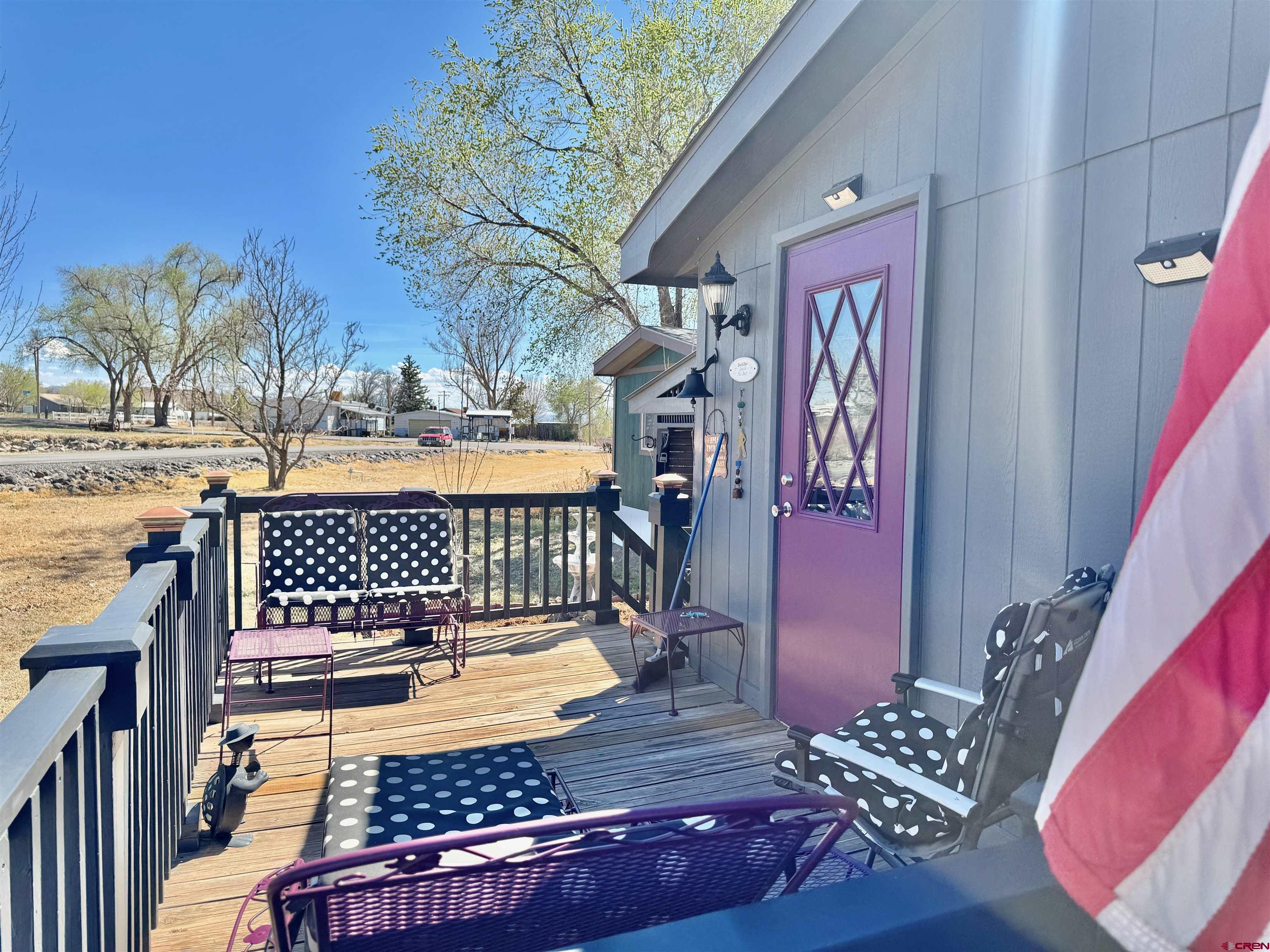 20020 Kenosha Road Austin, CO 81410 - Photo 29 of 40 a view of a chairs and bench in a balcony