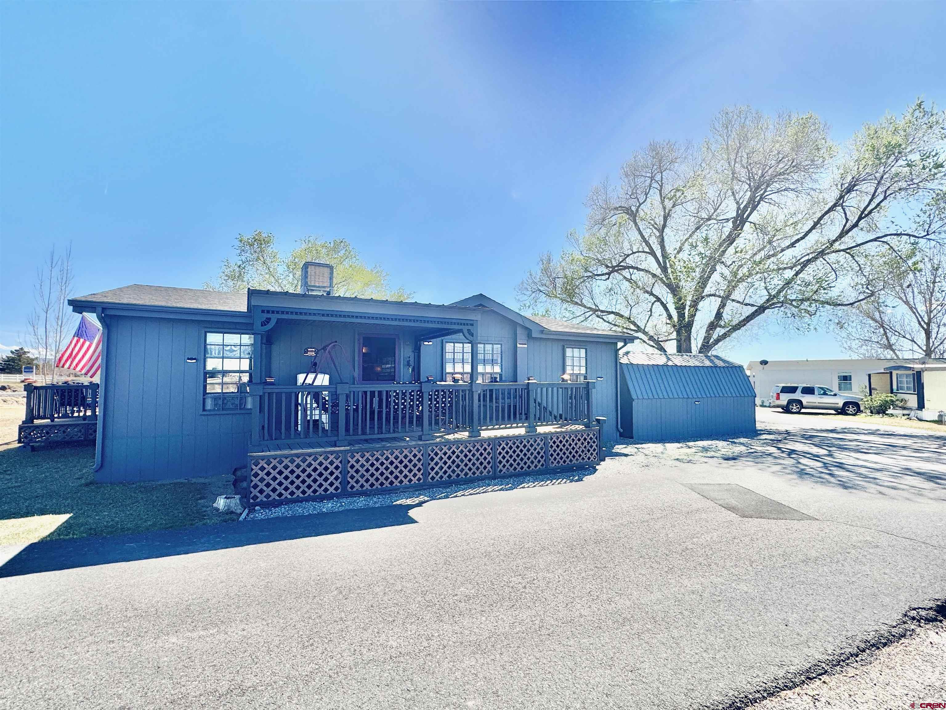 20020 Kenosha Road Austin, CO 81410 - Photo 35 of 40 a view of a house with a yard