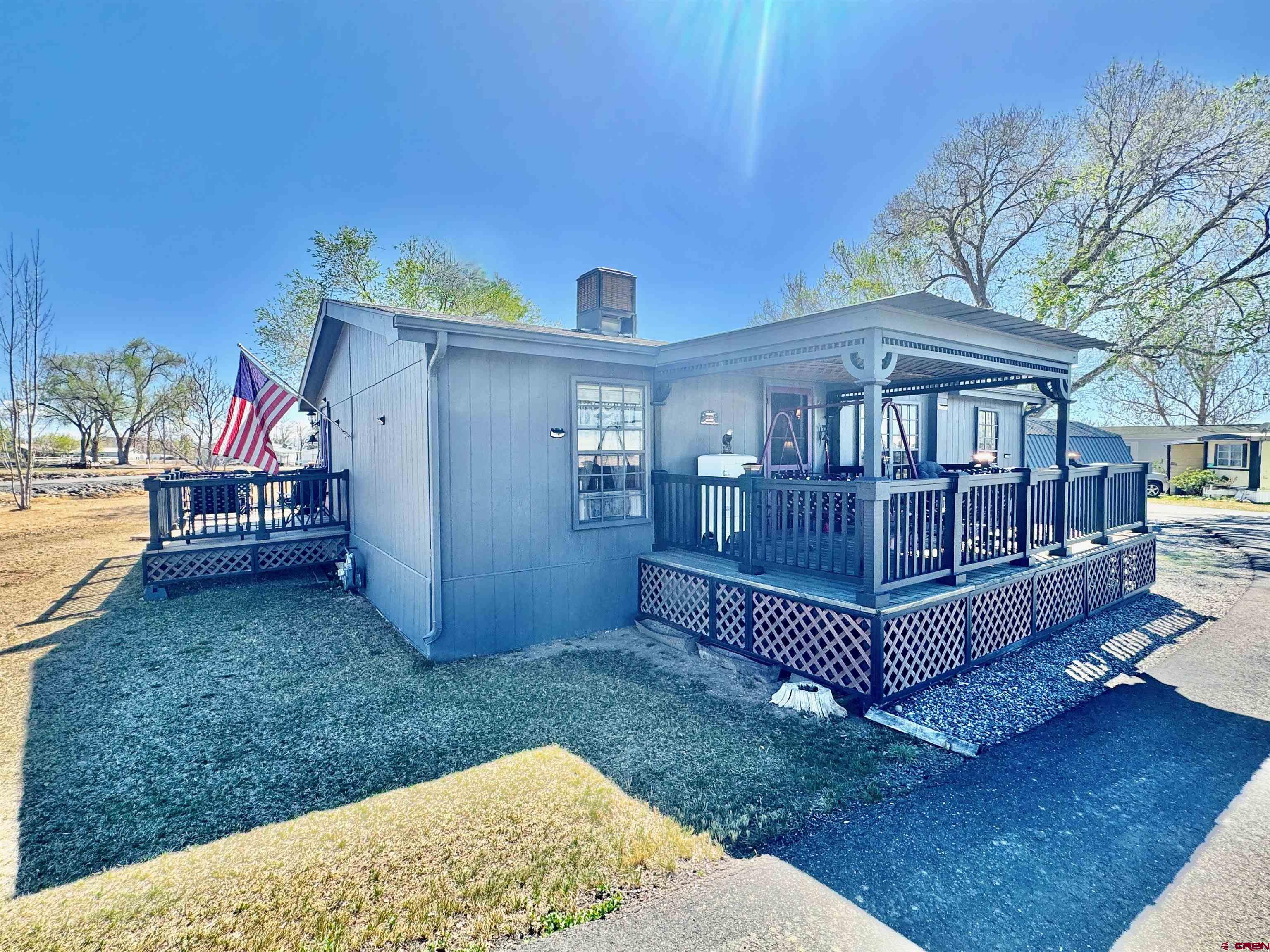 20020 Kenosha Road Austin, CO 81410 - Photo 36 of 40 a view of backyard with deck and garden