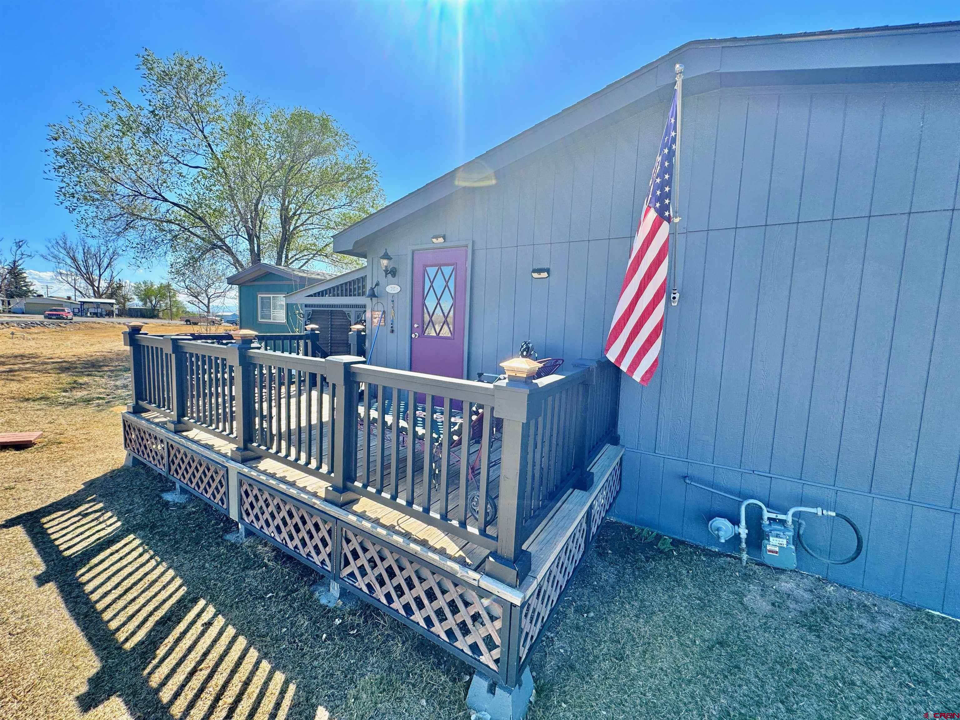 20020 Kenosha Road Austin, CO 81410 - Photo 37 of 40 a view of a porch with garden
