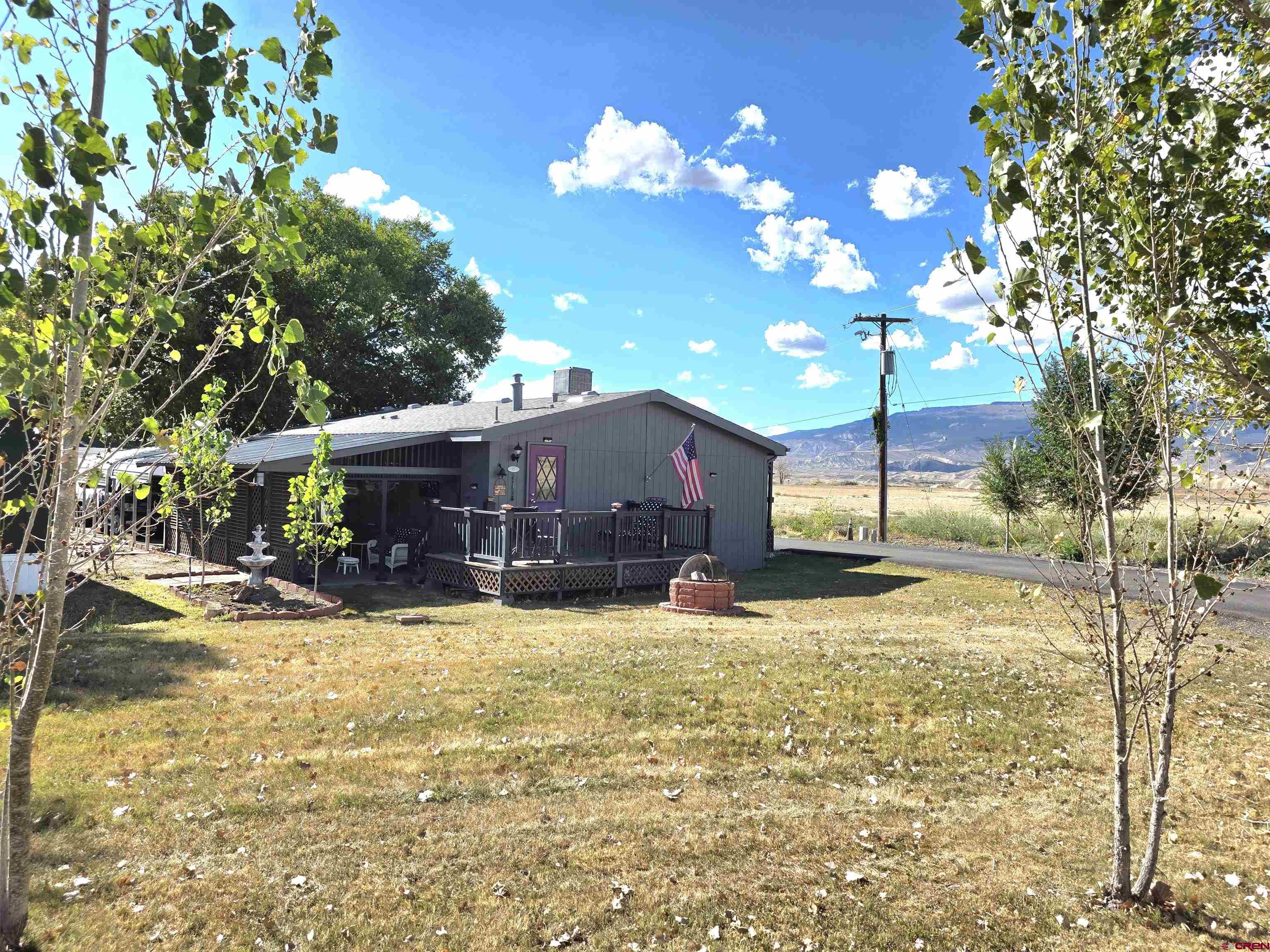 20020 Kenosha Road Austin, CO 81410 - Photo 40 of 40 a view of a house with a yard