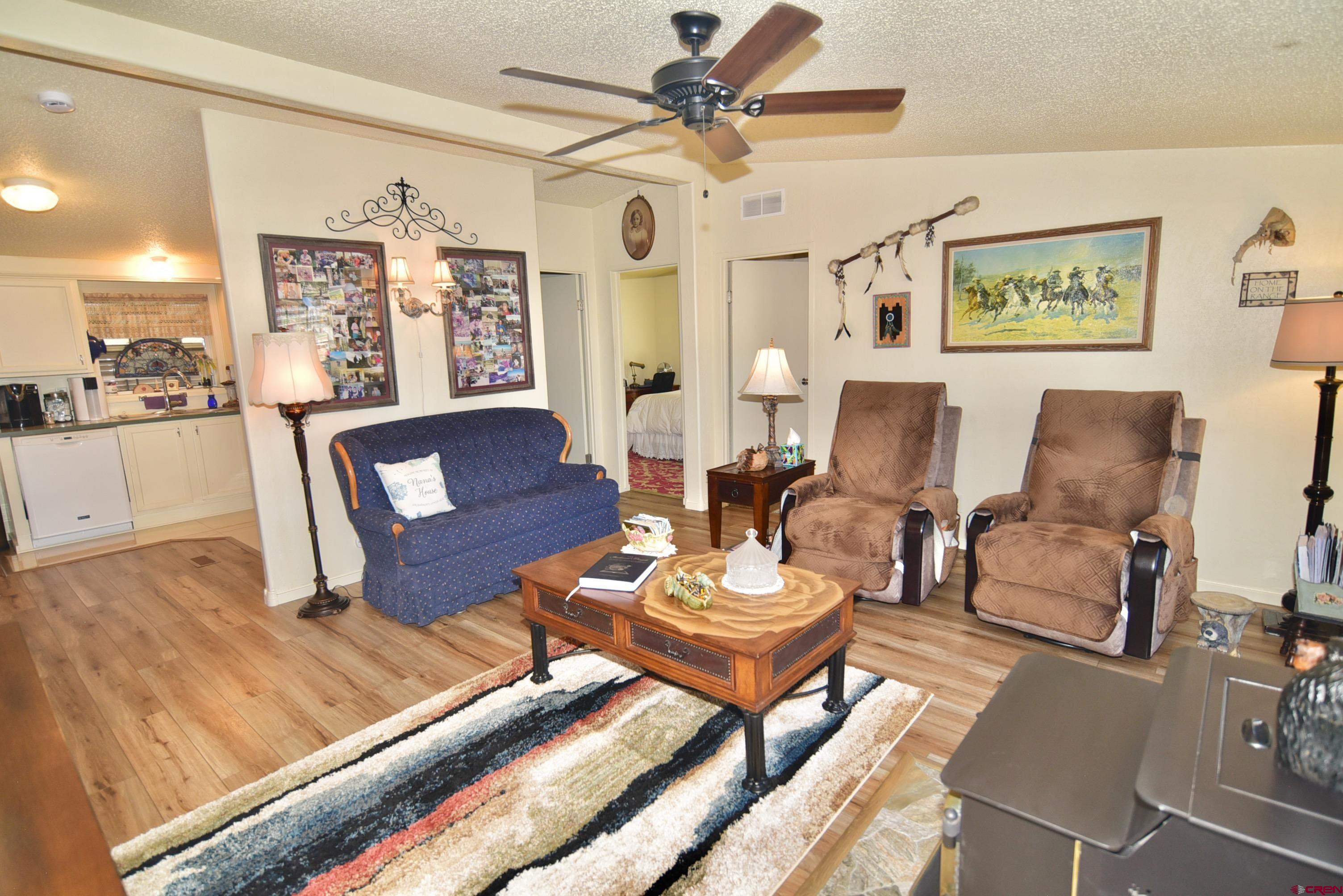 20020 Kenosha Road Austin, CO 81410 - Photo 4 of 40 a living room with furniture and a large window
