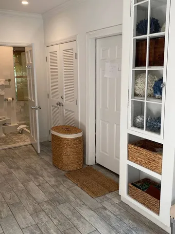 a bathroom with a tub and shower