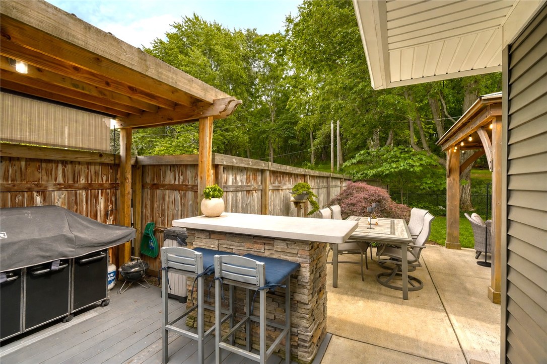 175 Longview Drive Webster, NY 14580 - Photo 42 of 47 Private backyard is a retreat. Patio, hot tub area