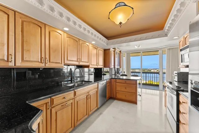 a kitchen with lots of counter top space and appliances