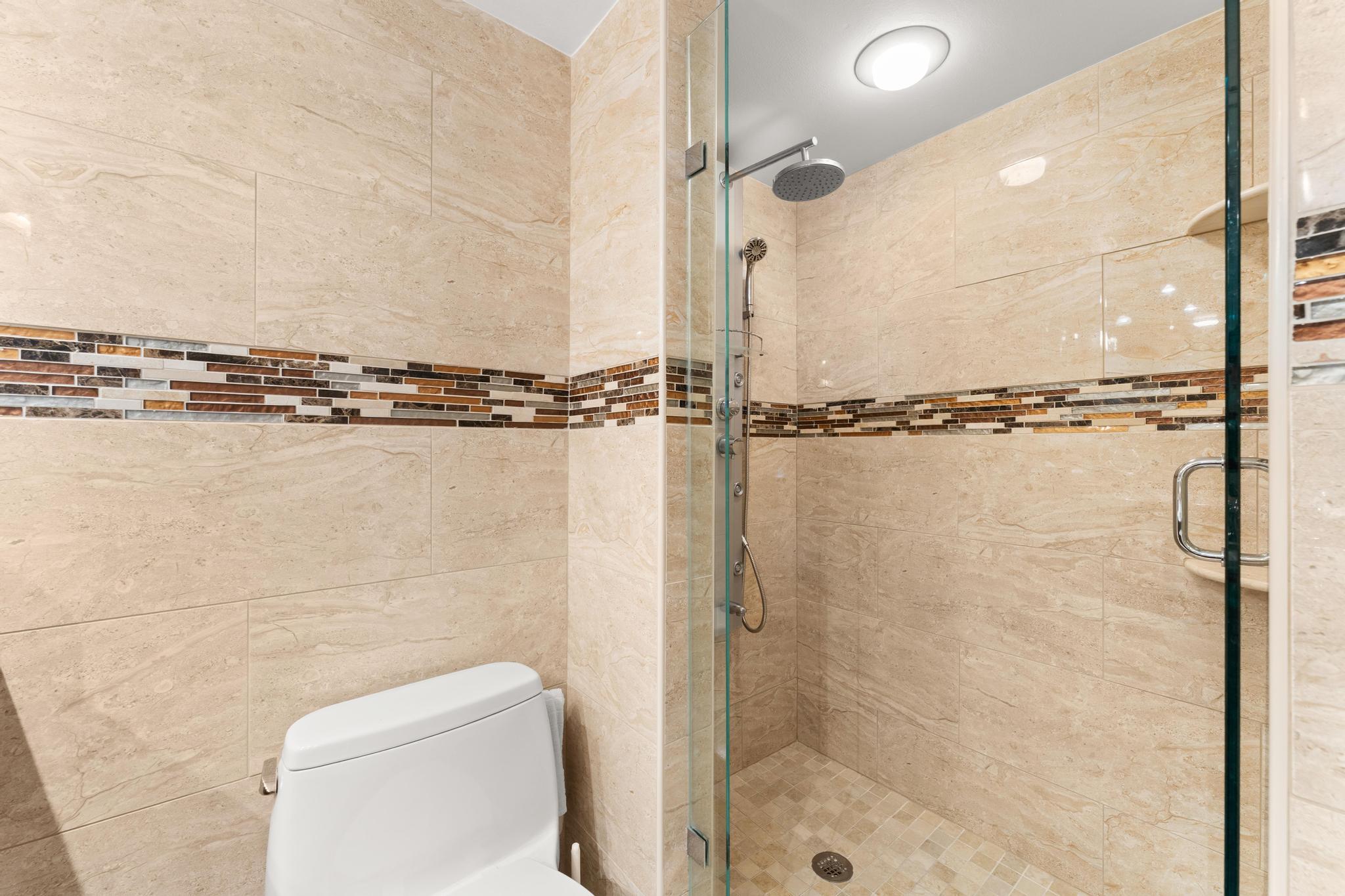 1900 Consulate Place, Unit 2002 West Palm Beach, FL 33401 - Photo 22 of 29 a bathroom with a shower and a toilet