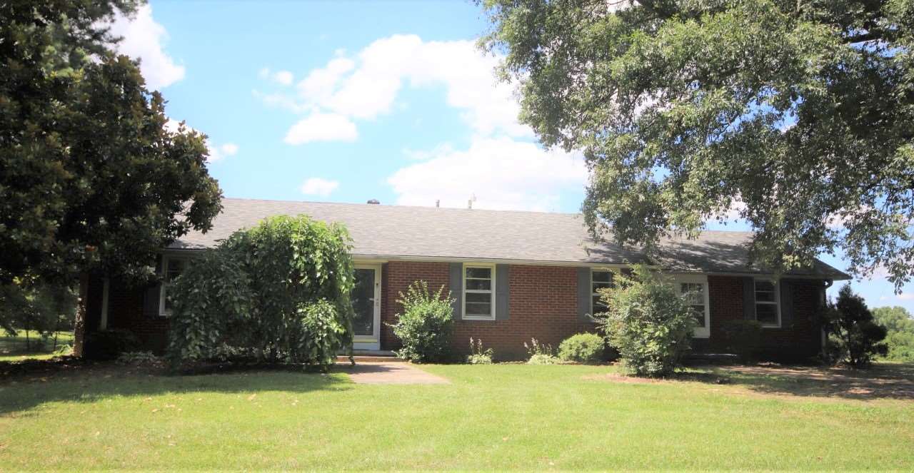 1419 Hurricane Hill Road Ripley, TN 38063 - Photo 3 of 21 front view of a house with a yard
