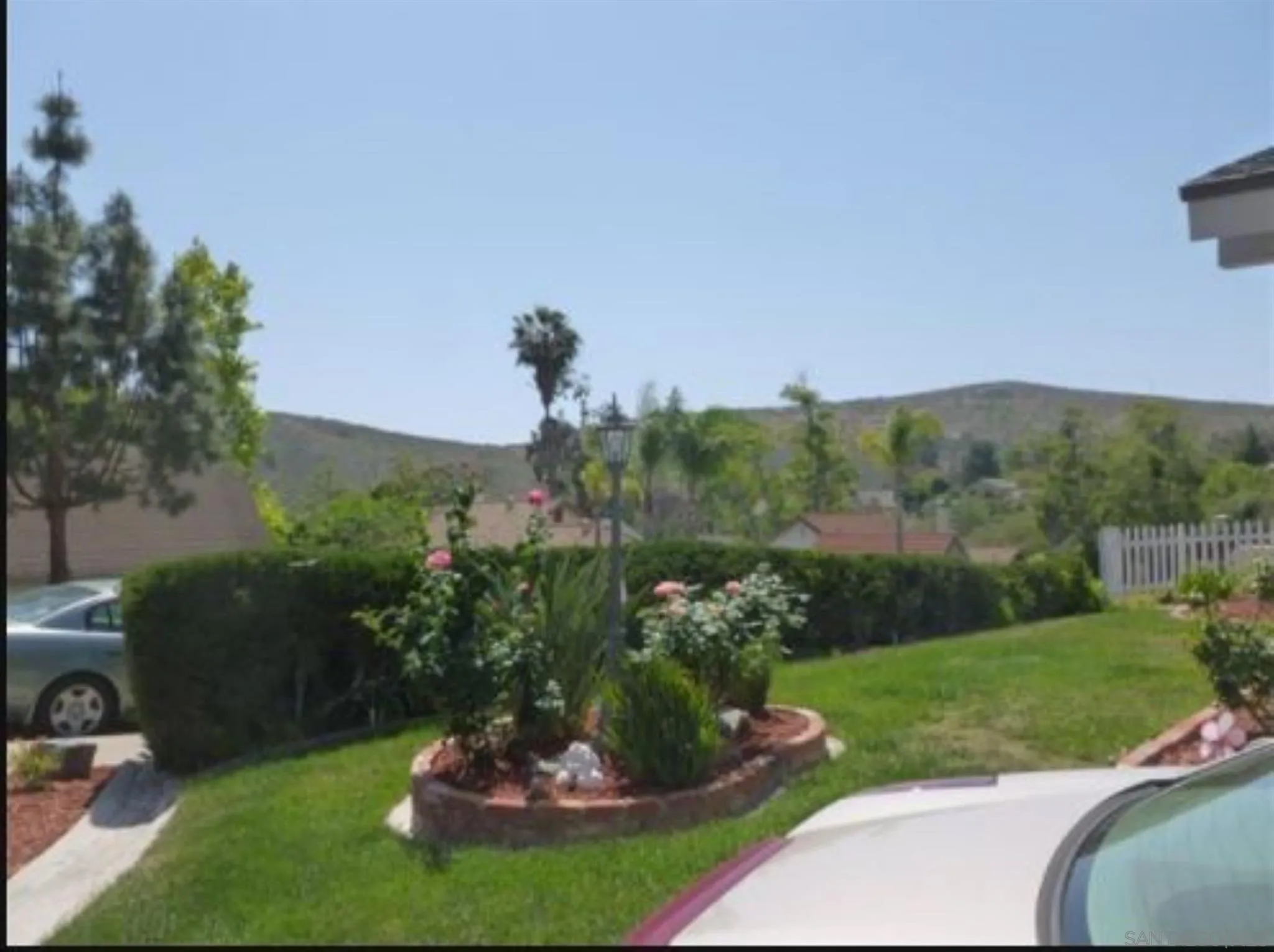 a view of a garden with a flower garden