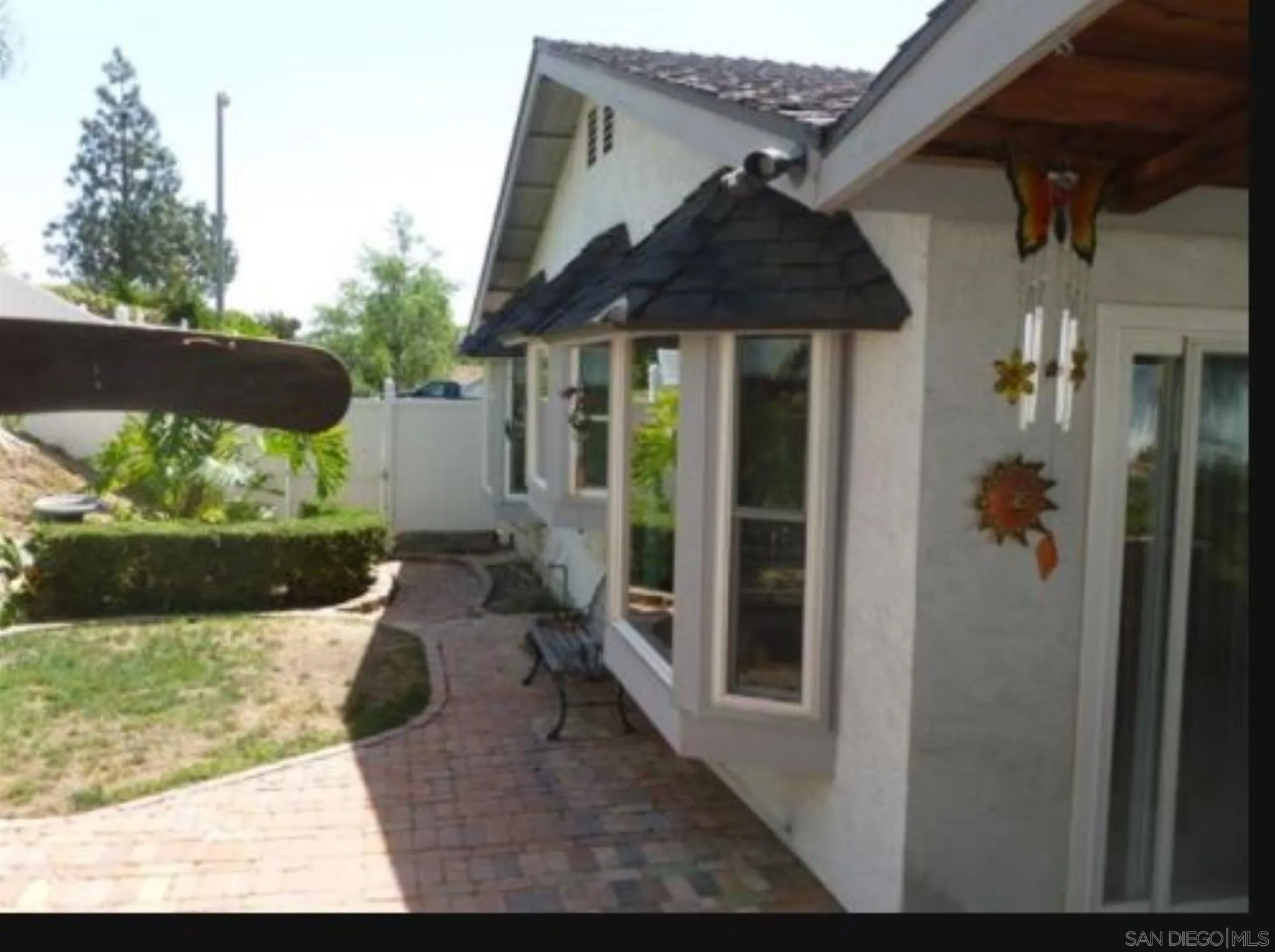 9934 Ivy Street Spring Valley, CA 91977 - Photo 12 of 12 a backyard of a house with table and chairs