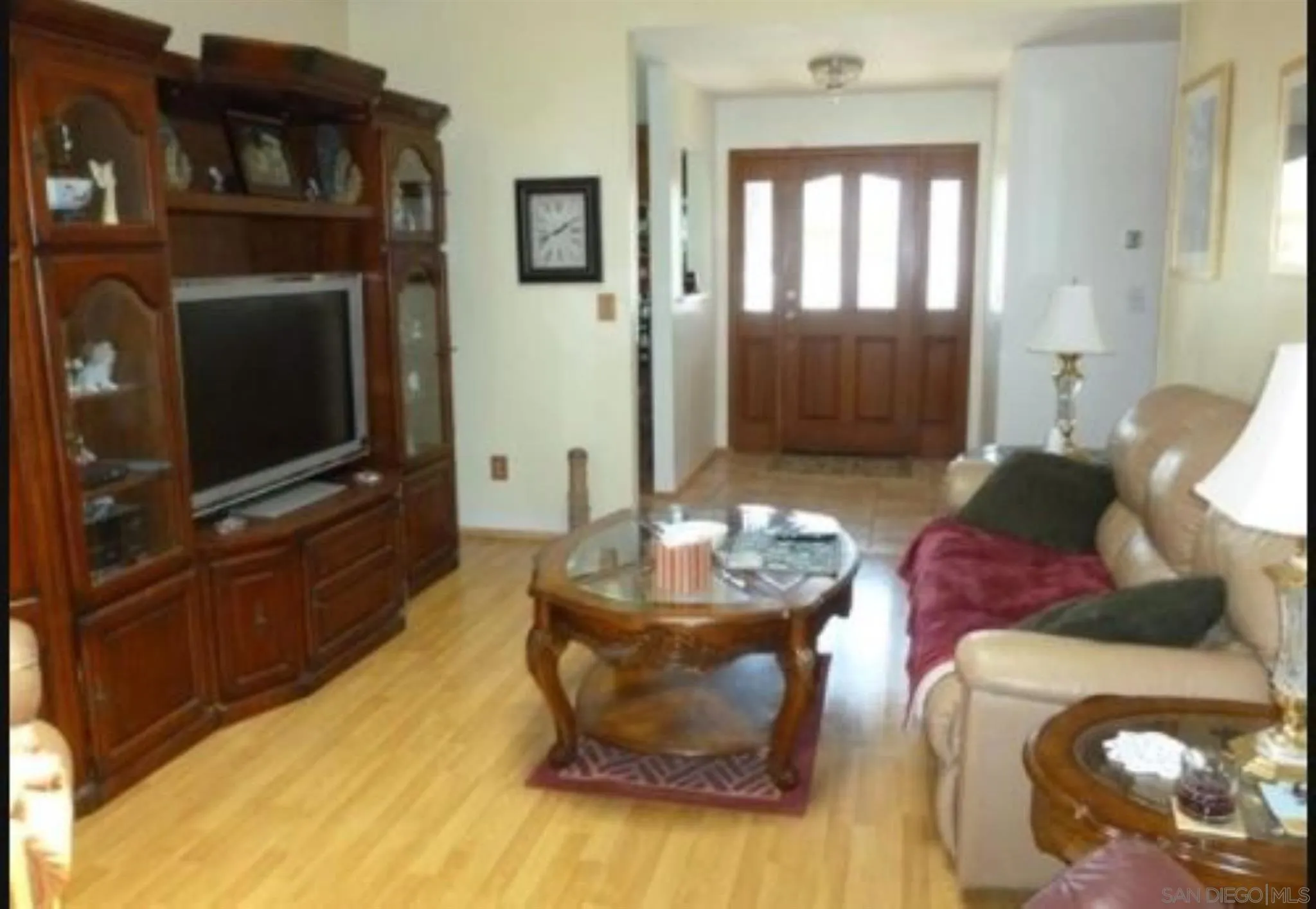 9934 Ivy Street Spring Valley, CA 91977 - Photo 4 of 12 a living room with furniture and a flat screen tv