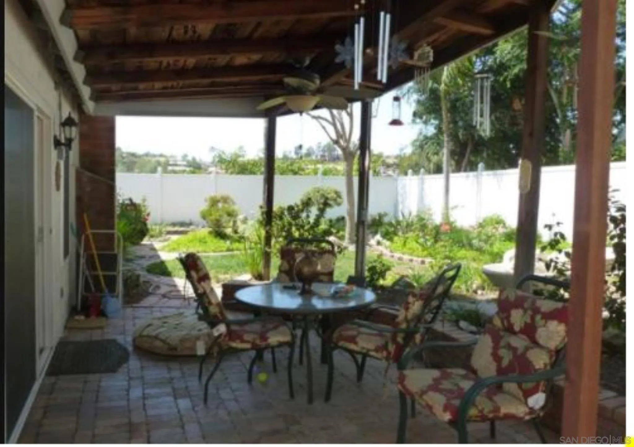 9934 Ivy Street Spring Valley, CA 91977 - Photo 8 of 12 a view of a porch with chairs and backyard