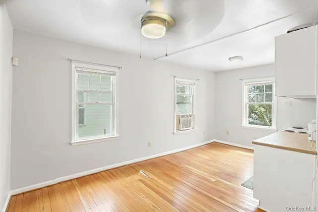 a view of a room with windows