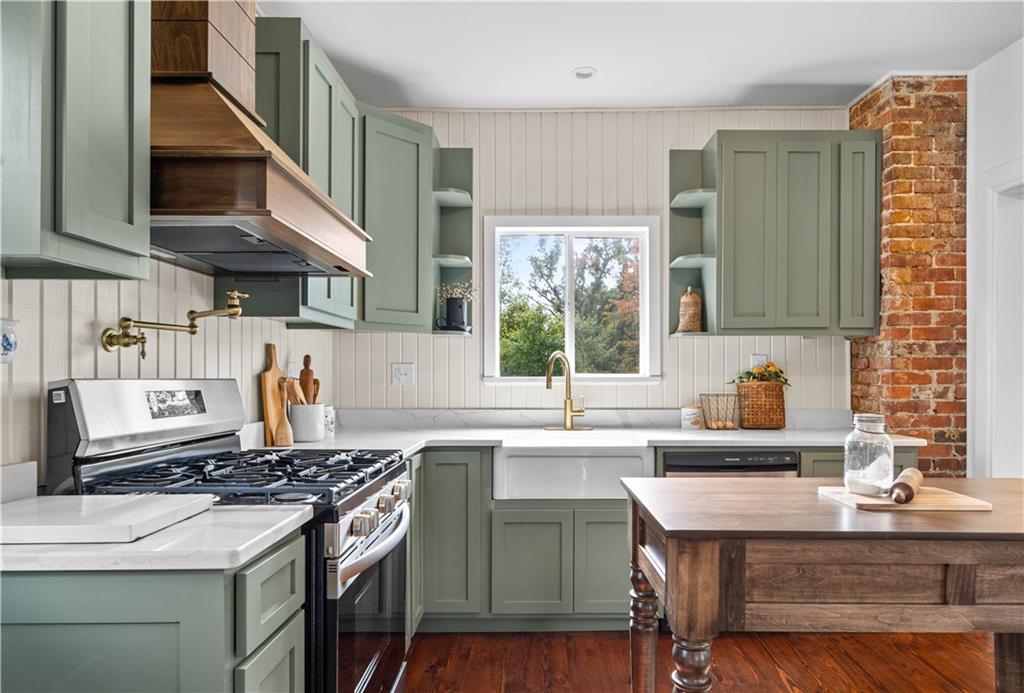 650 Hood School Road Indiana, PA 15701 - Photo 23 of 47 a kitchen with a sink stove and cabinets