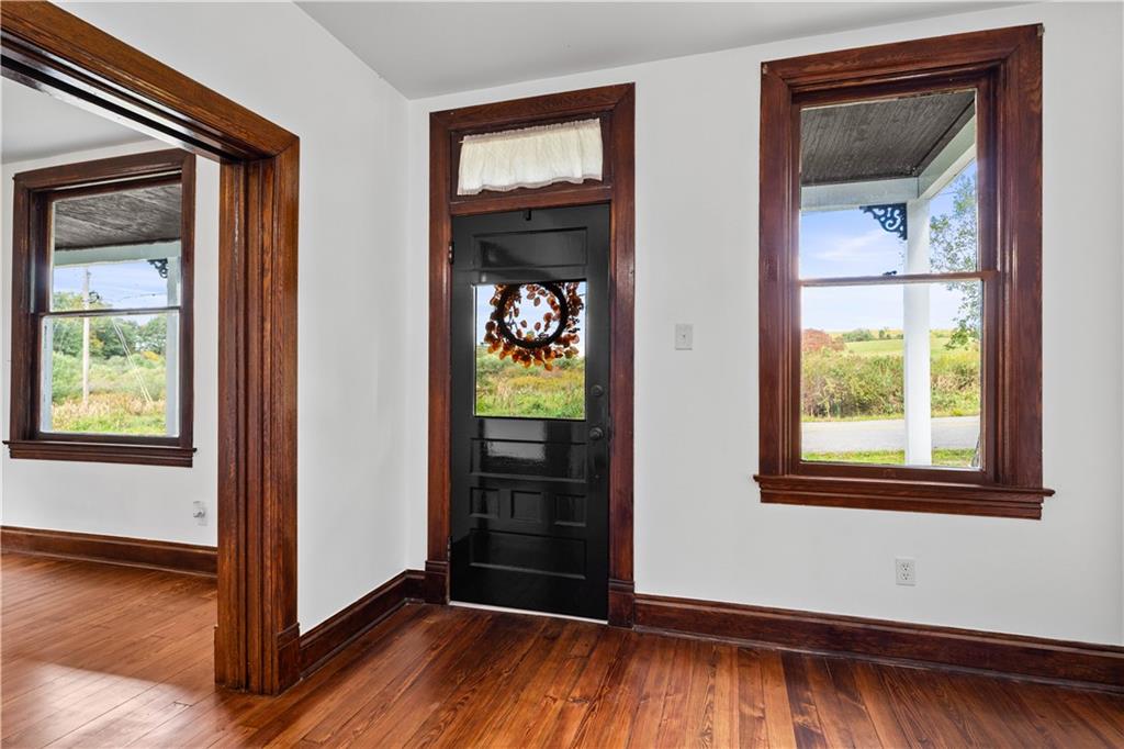 650 Hood School Road Indiana, PA 15701 - Photo 6 of 47 an empty room with wooden floor closet and windows