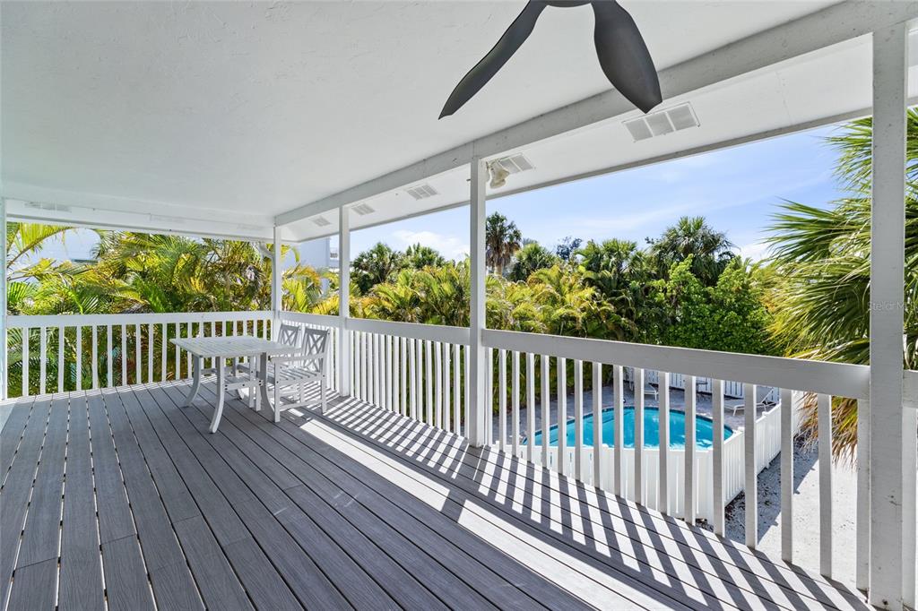 315 Spring Avenue Anna Maria, FL 34216 - Photo 23 of 63 a view of a balcony with wooden floor