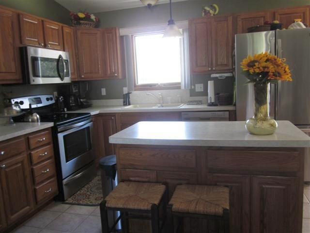 755 Gainsboro Road Lake Summerset, IL 61019 - Photo 3 of 25 a kitchen with a sink cabinets and appliances