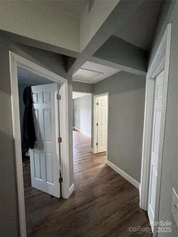 a view of entryway with wooden floor