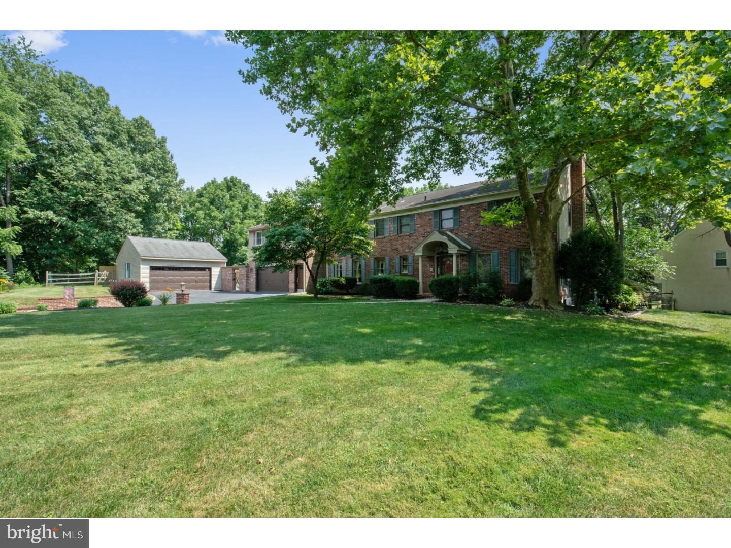 796 Worthington Road Wayne, PA 19087 - Photo 1 of 25 a front view of a house with a yard