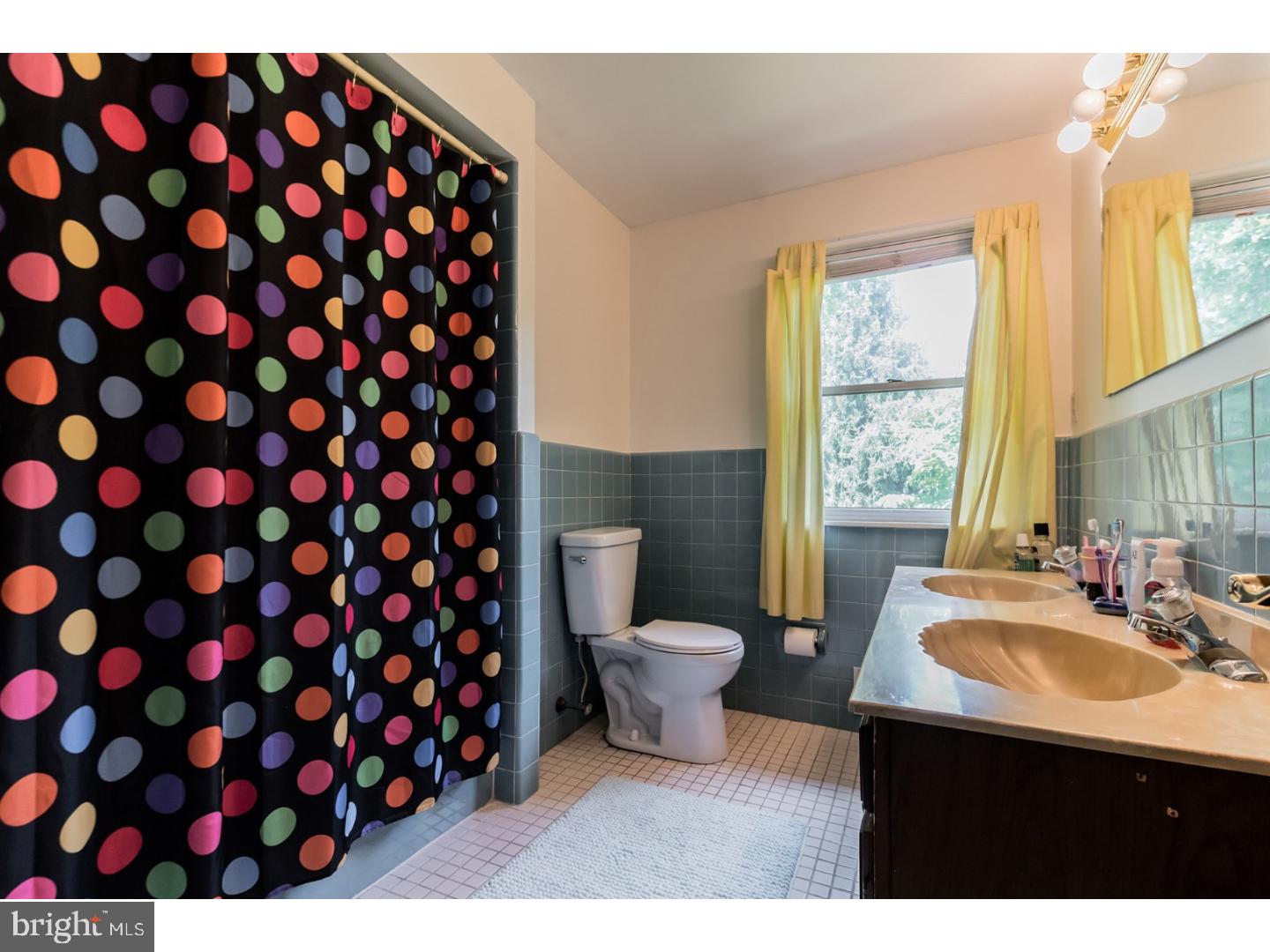 796 Worthington Road Wayne, PA 19087 - Photo 17 of 25 a bathroom with a sink mirror vanity and toilet