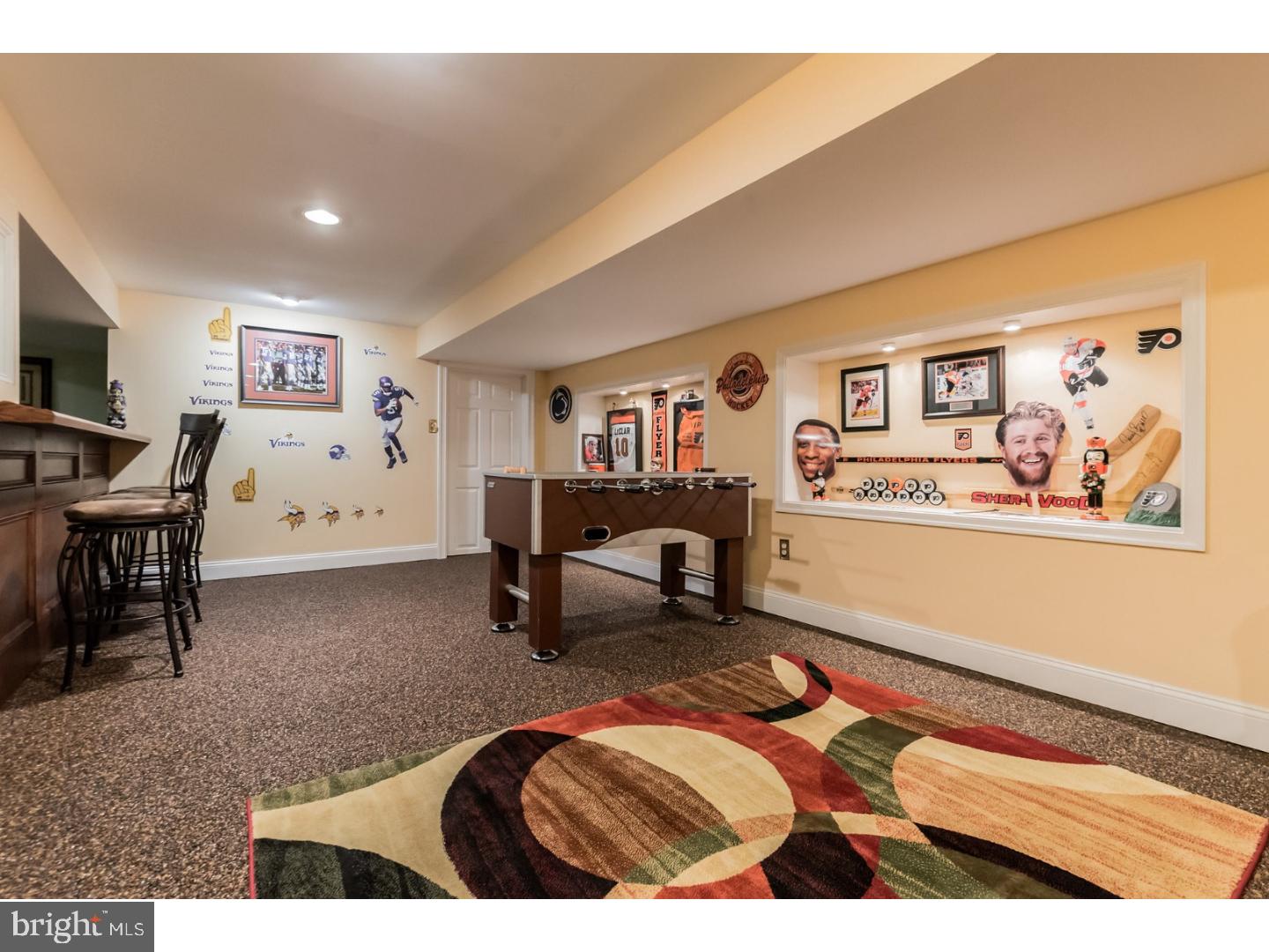 796 Worthington Road Wayne, PA 19087 - Photo 18 of 25 a living room with furniture and a flat screen tv