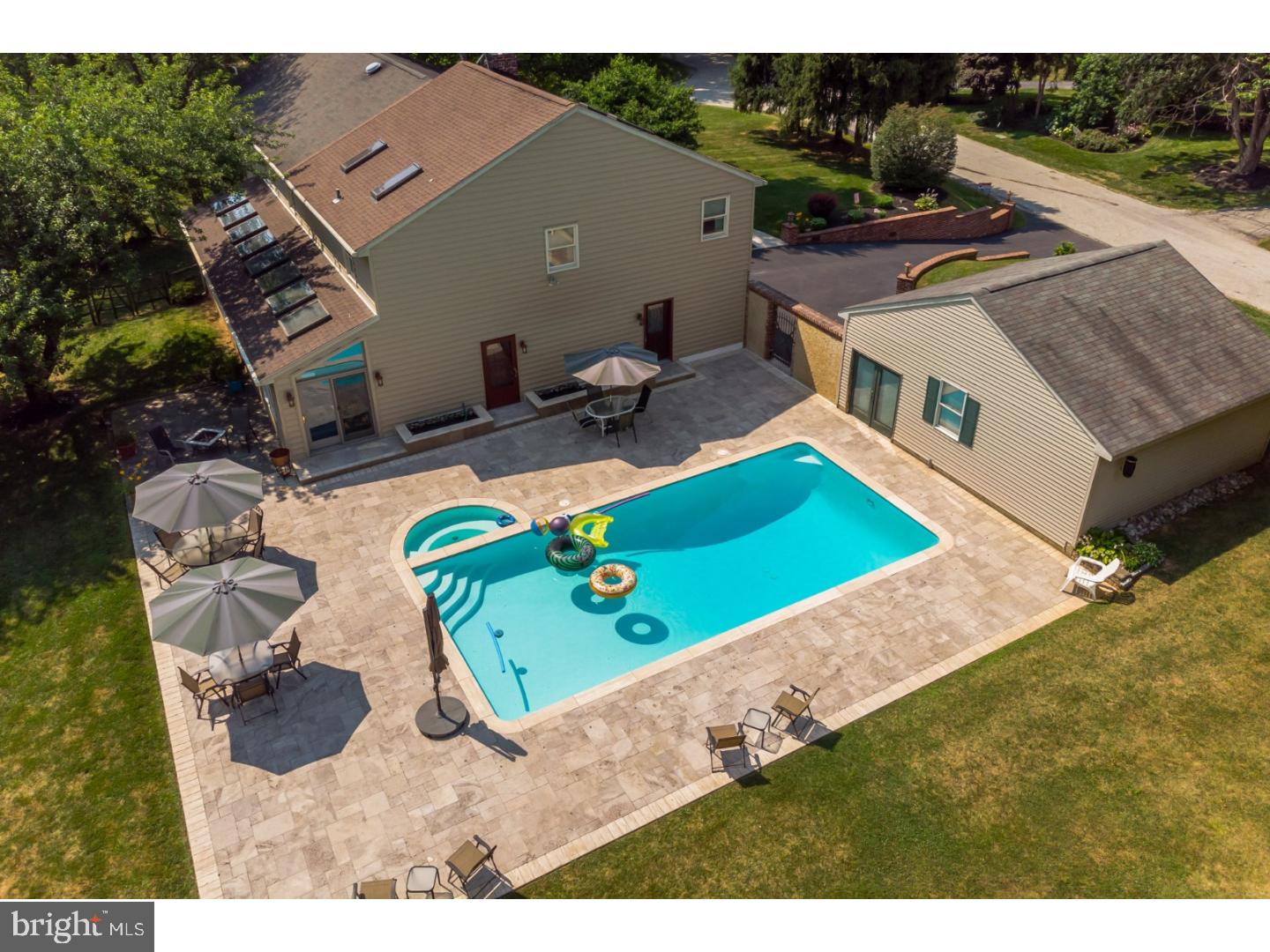 796 Worthington Road Wayne, PA 19087 - Photo 22 of 25 a view of a backyard with plants and a patio