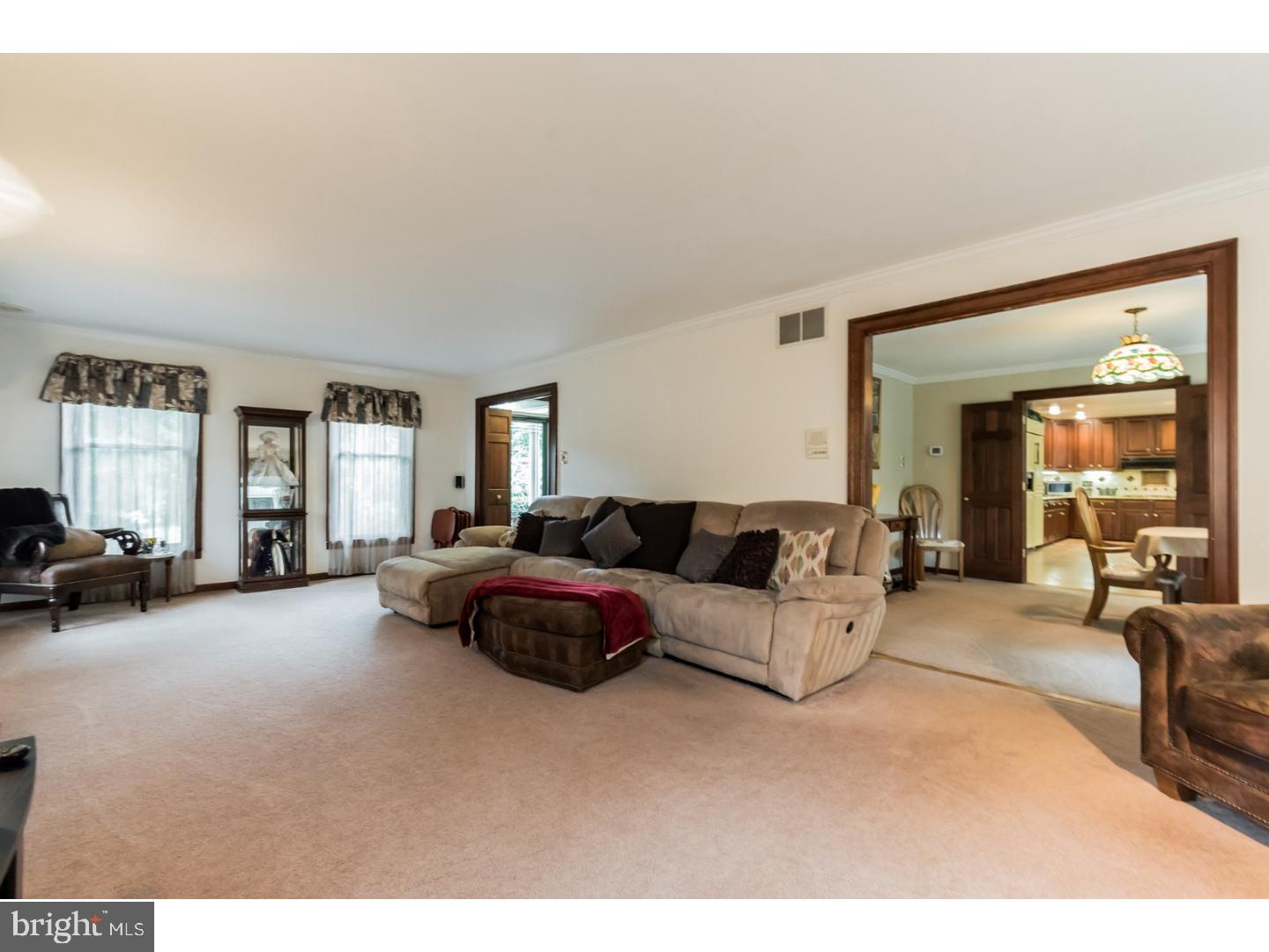 796 Worthington Road Wayne, PA 19087 - Photo 5 of 25 a living room with furniture and a large window