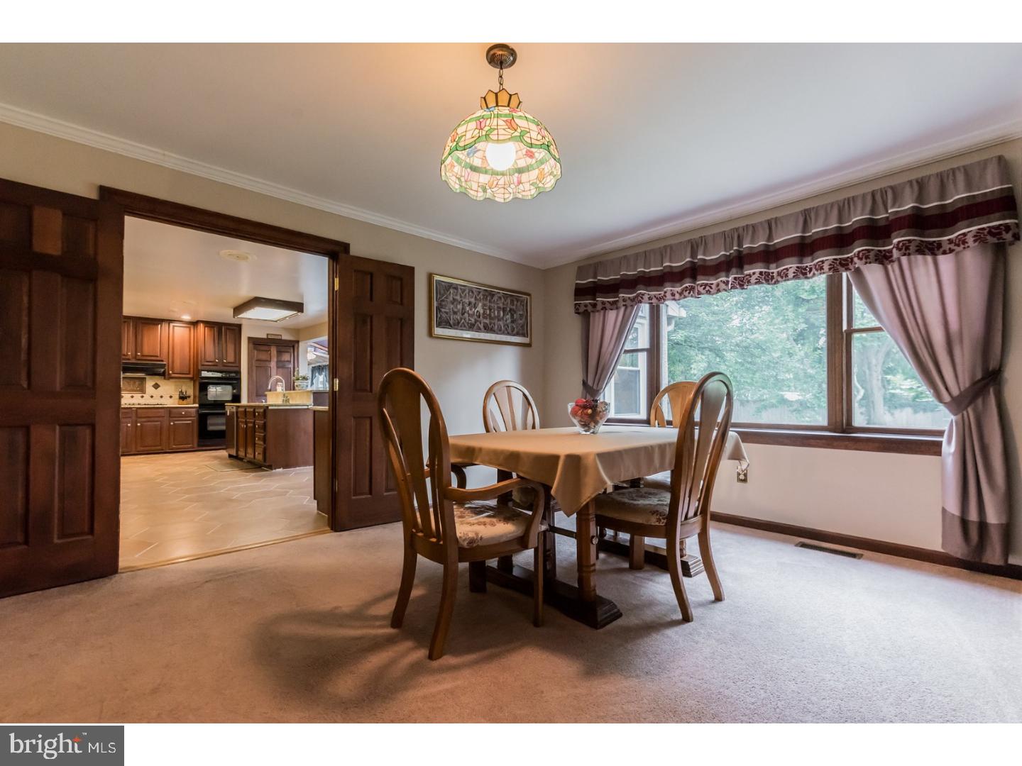 796 Worthington Road Wayne, PA 19087 - Photo 6 of 25 a view of a dining room with furniture window and outside view