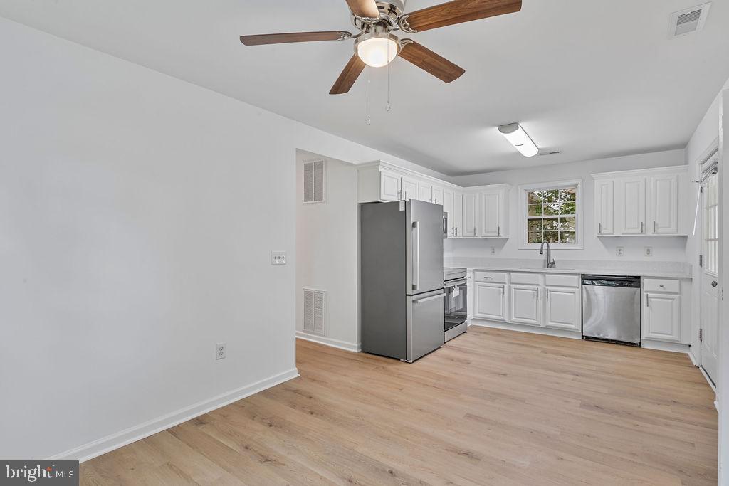 905 Hanover Street Salisbury, MD 21801 - Photo 16 of 40 Bright and airy kitchen with modern finishes.