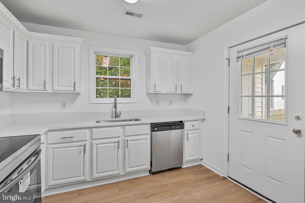 905 Hanover Street Salisbury, MD 21801 - Photo 19 of 40 Bright and airy kitchen with modern finishes.