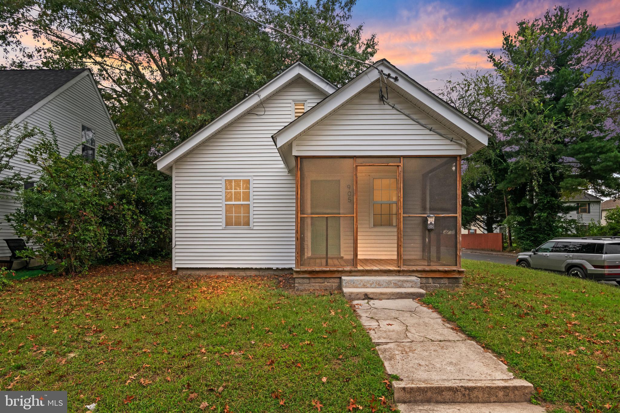 905 Hanover Street Salisbury, MD 21801 - Photo 2 of 40 Charming home with inviting porch and greenery.