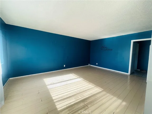 a bathroom with a toilet and a tub
