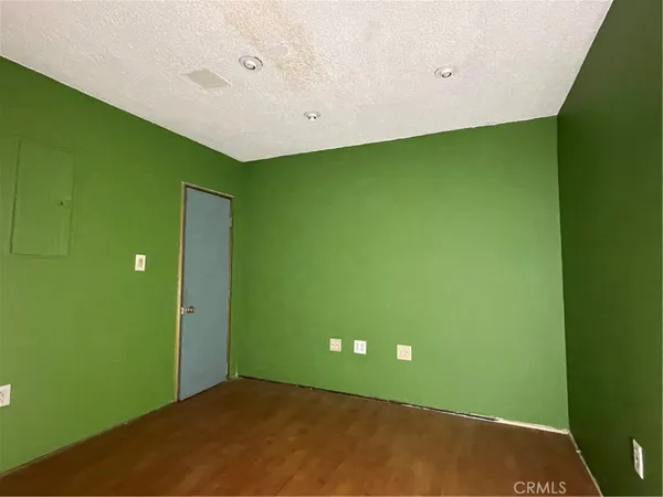 a white toilet sitting next to a bath tub