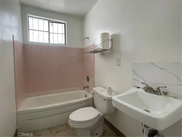 a view of a utility room with window