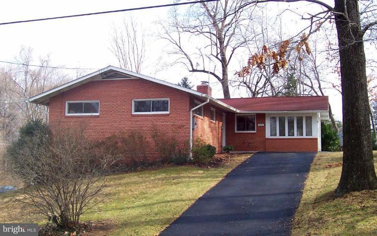 3400 Andover Drive Fairfax, VA 22030 - Photo 1 of 19 a front view of a house with garden