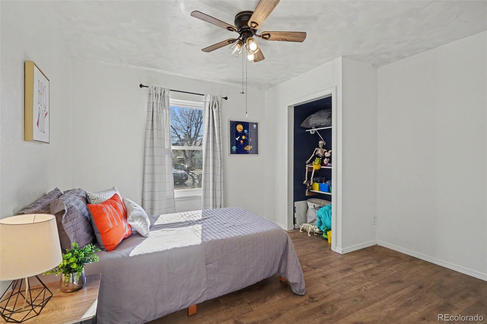 1632 South Rifle Street Aurora, CO 80017 - Photo 15 of 22 a living room with furniture and a window