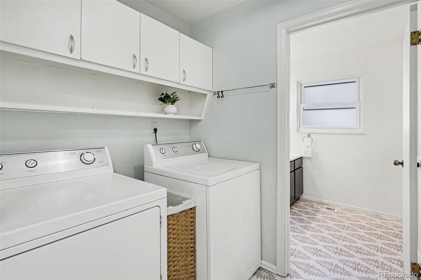 1632 South Rifle Street Aurora, CO 80017 - Photo 17 of 22 a utility room with dryer and washer