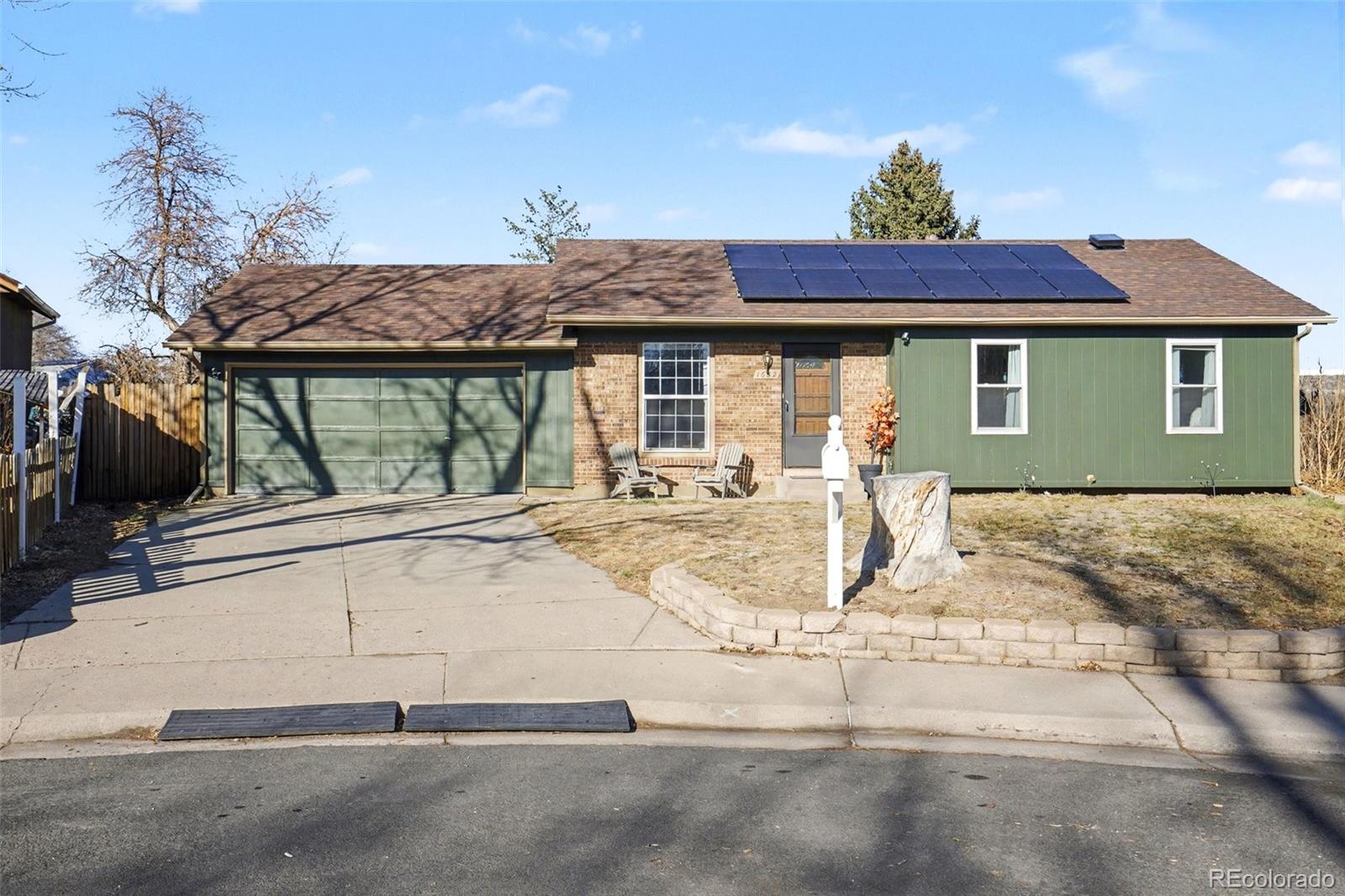 1632 South Rifle Street Aurora, CO 80017 - Photo 2 of 22 a view of a house with a sink and yard