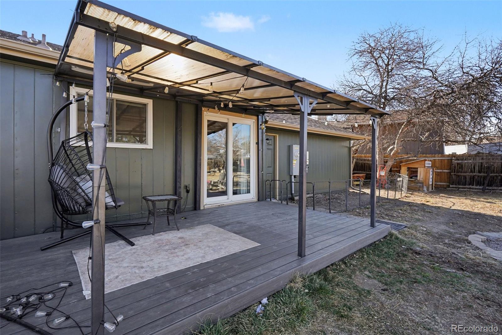 1632 South Rifle Street Aurora, CO 80017 - Photo 21 of 22 a view of a house with a patio