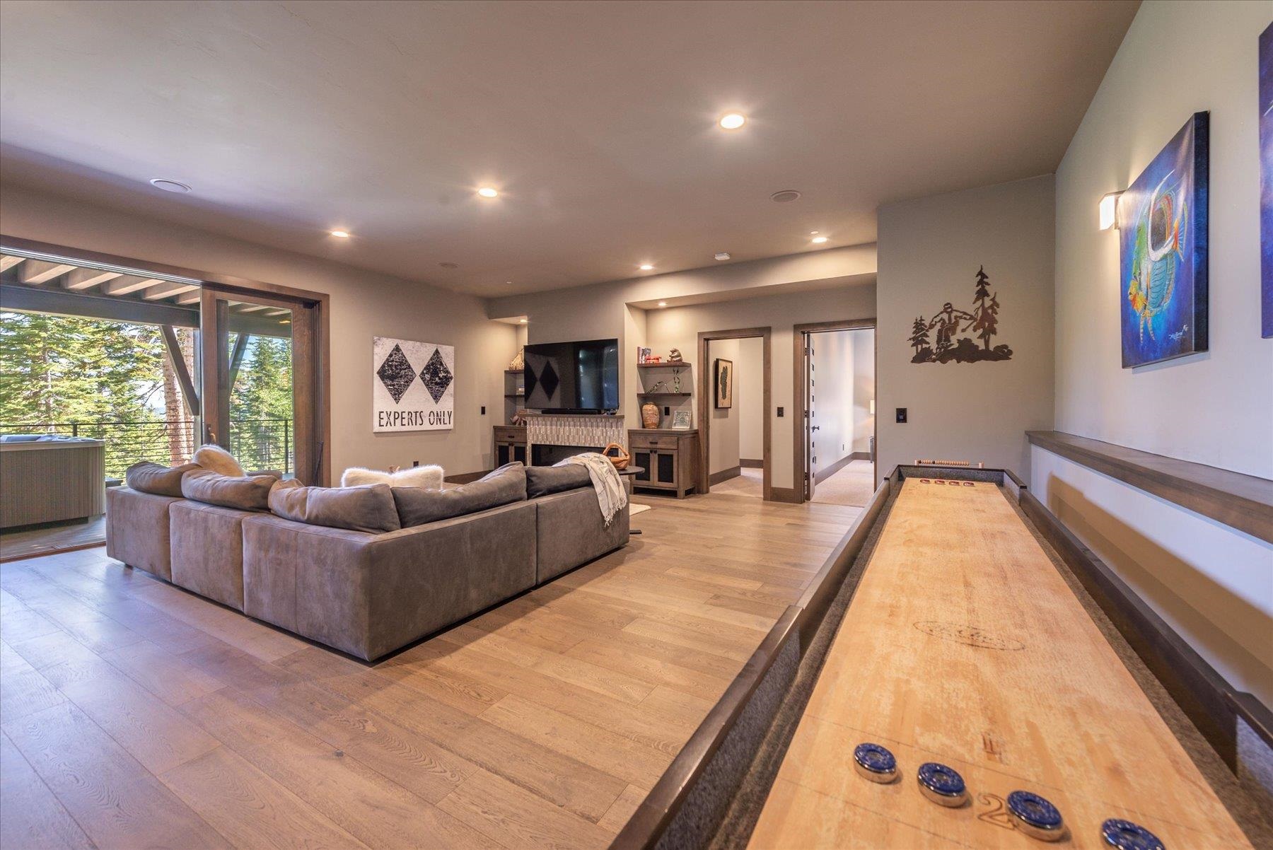 15339 Ski Slope Way Truckee, CA 96161 - Photo 16 of 28 a living room with furniture and a large window