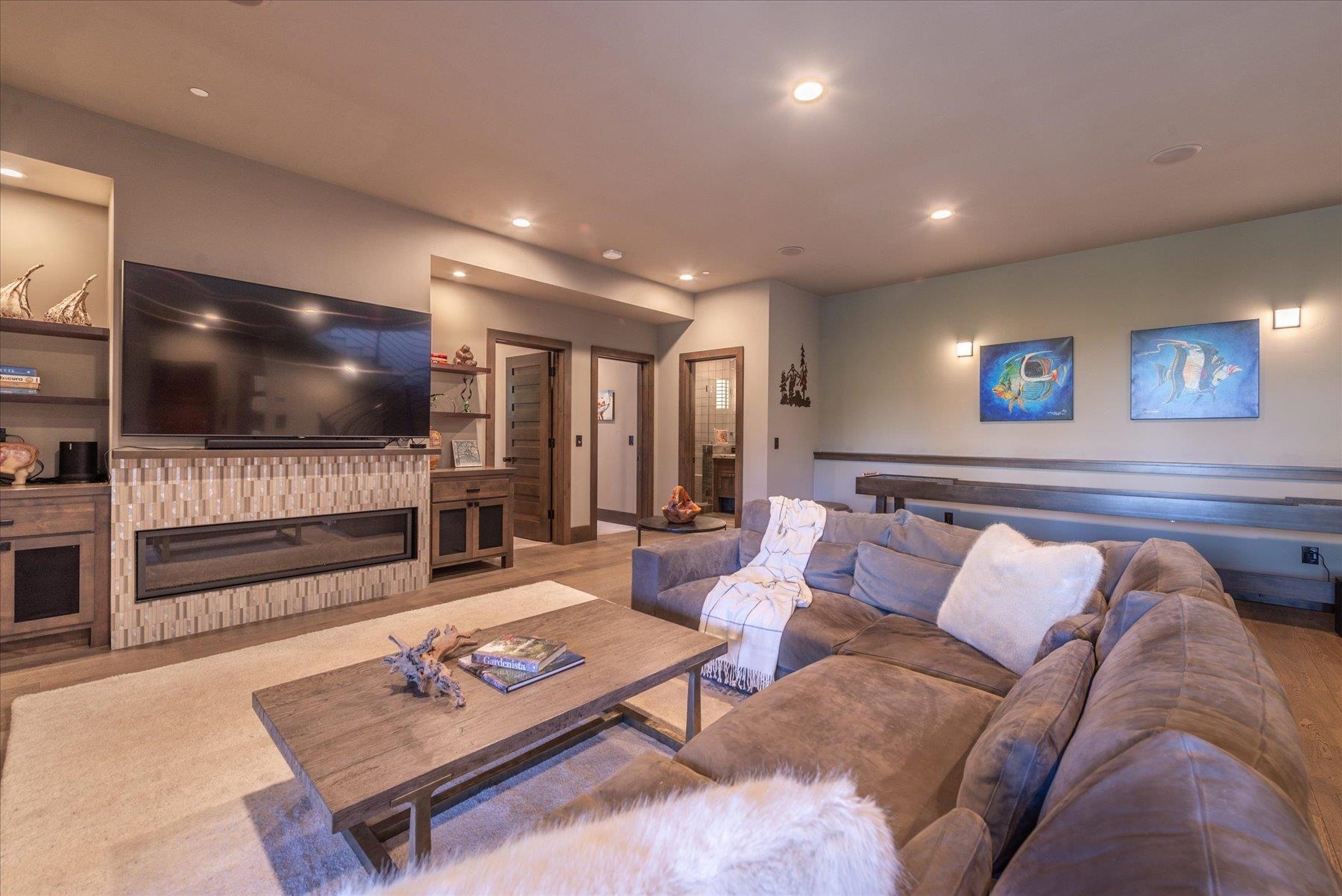 15339 Ski Slope Way Truckee, CA 96161 - Photo 17 of 28 a living room with furniture and a flat screen tv