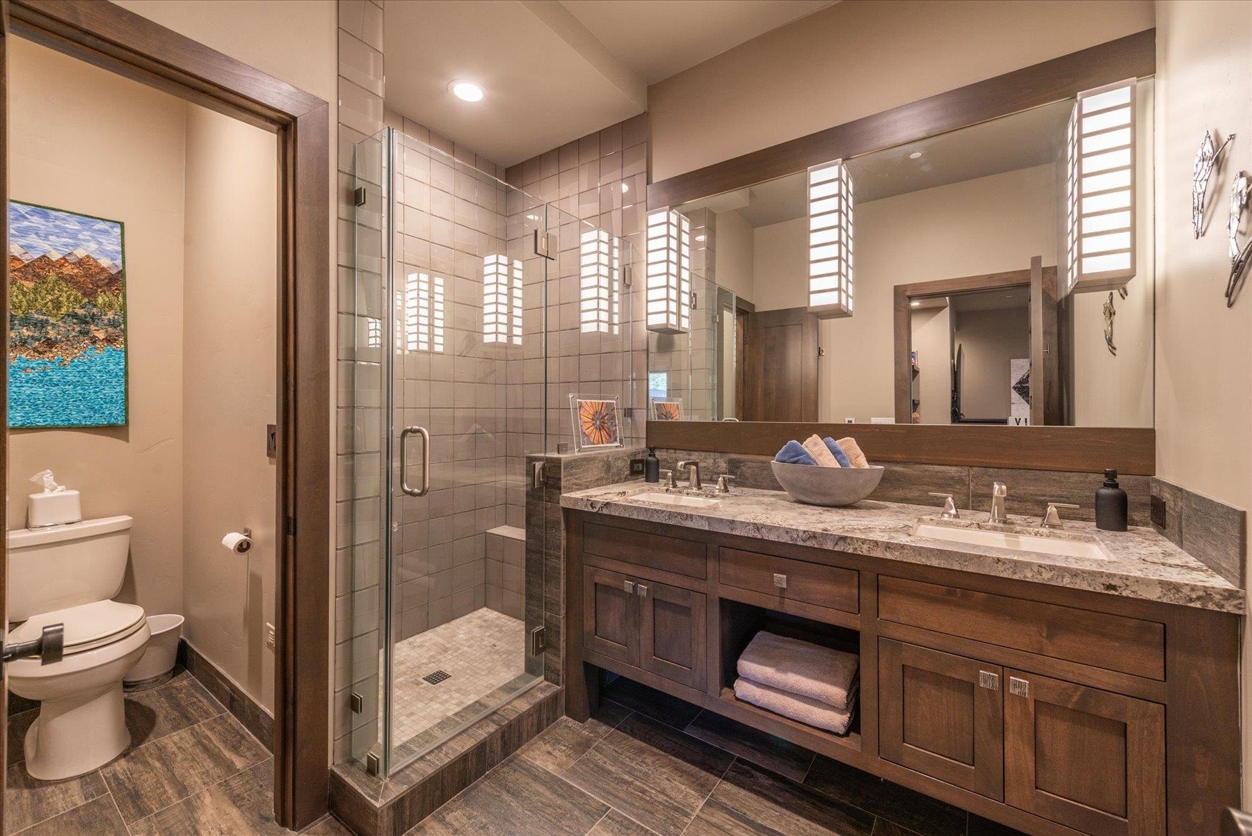 15339 Ski Slope Way Truckee, CA 96161 - Photo 18 of 28 a bathroom with a sink and a mirror