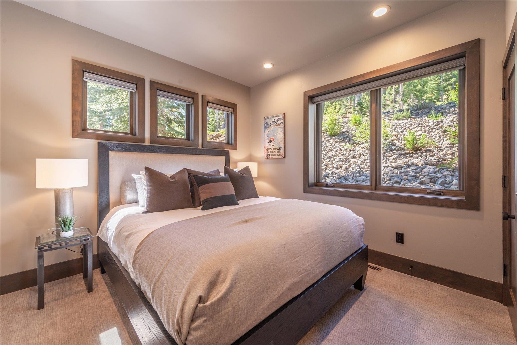 15339 Ski Slope Way Truckee, CA 96161 - Photo 19 of 28 a bed sitting in a bedroom next to a window